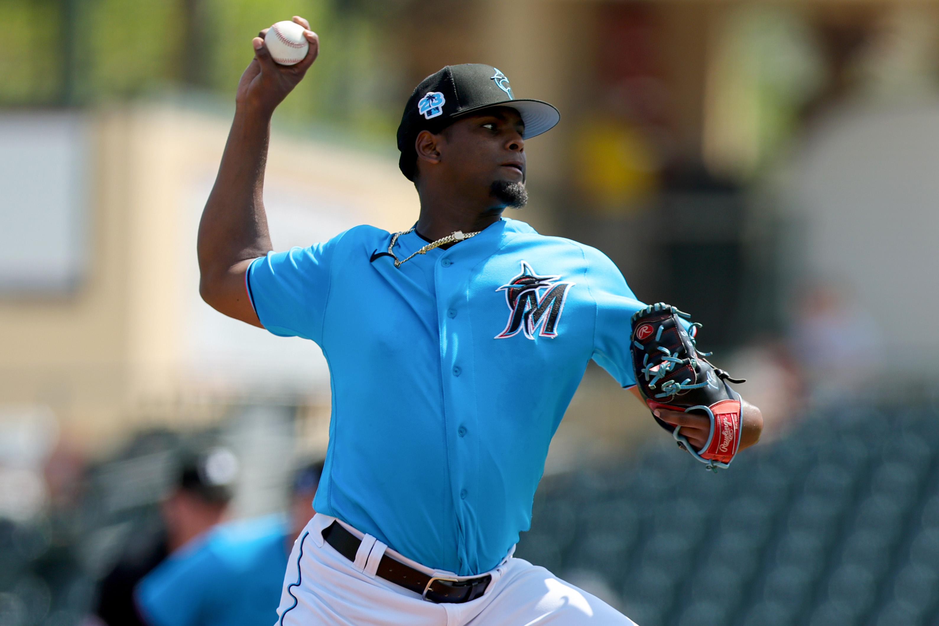 Edward Cabrera #27 of the Miami Marlins delivers a pitch against the Washington Nationals during the first inning of the spring training game at Roger Dean Stadium on March 07, 2023 in Jupiter, Florida.
