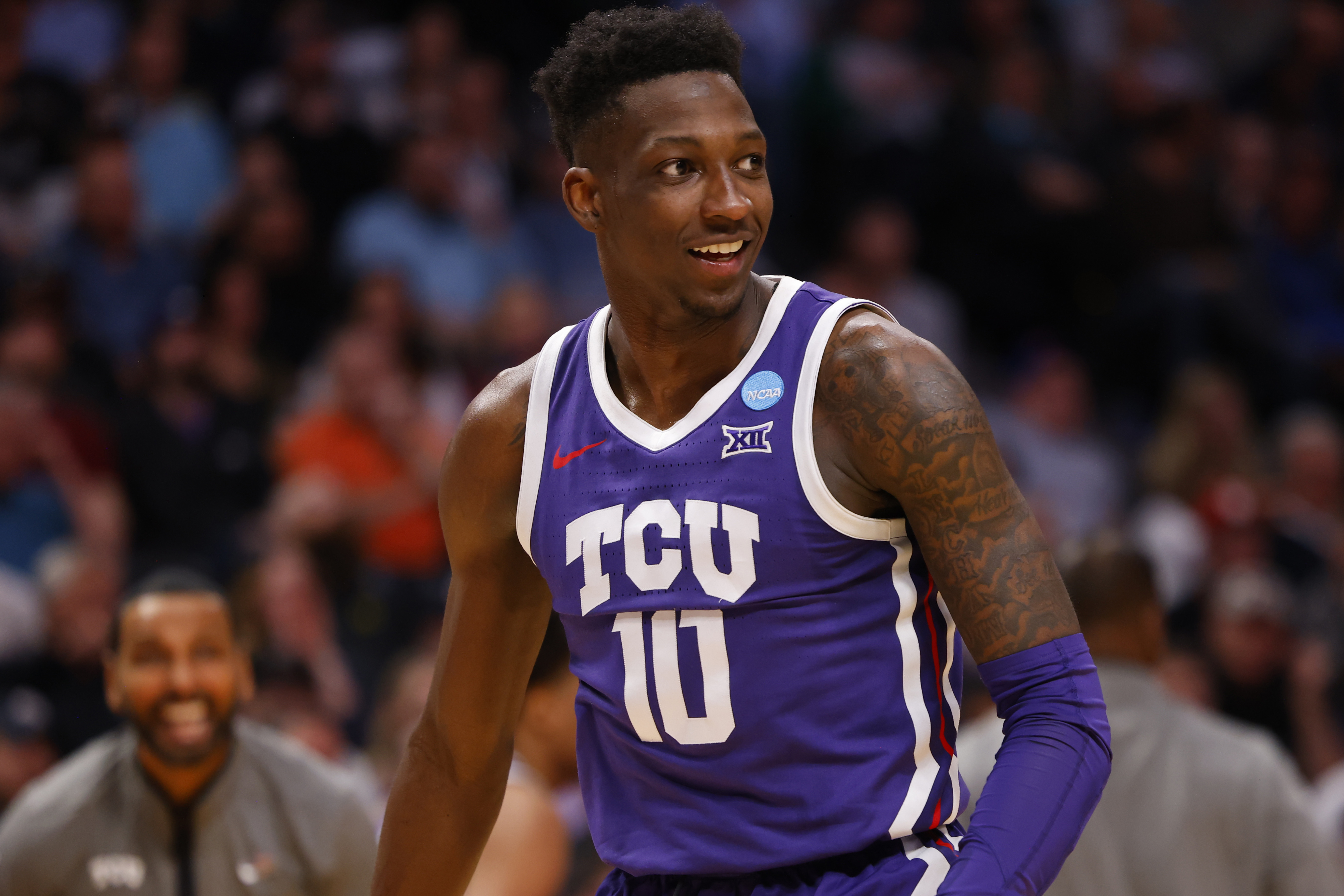 TCU Horned Frogs guard Damion Baugh celebrates in the first half against the Gonzaga Bulldogs at Ball Arena.