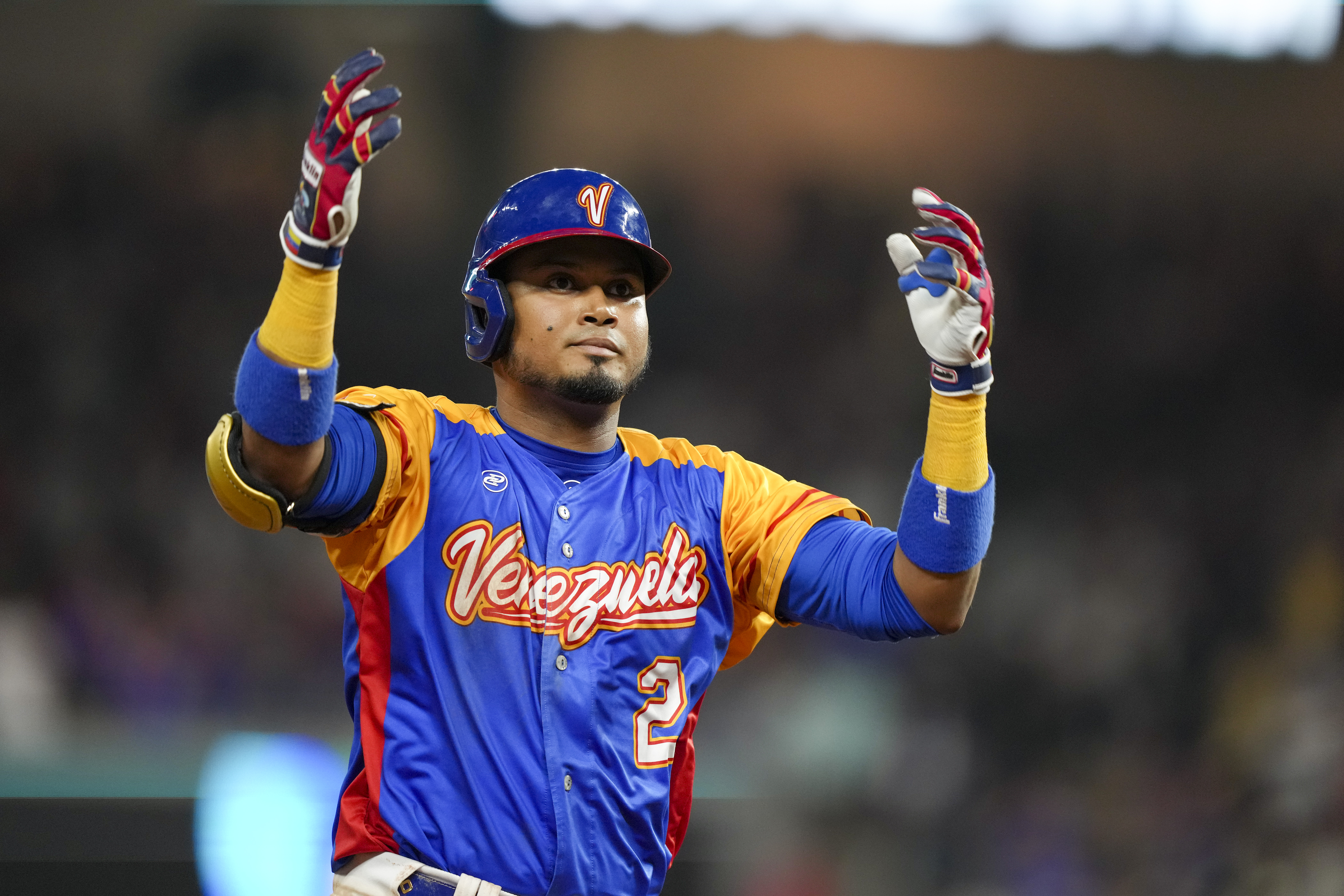 Luis Arraez #2 of Venezuela celebrates after hitting a home run during the seventh inning of a 2023 World Baseball Classic Quarterfinal game against The United States at loanDepot park on March 18, 2023 in Miami, Florida.