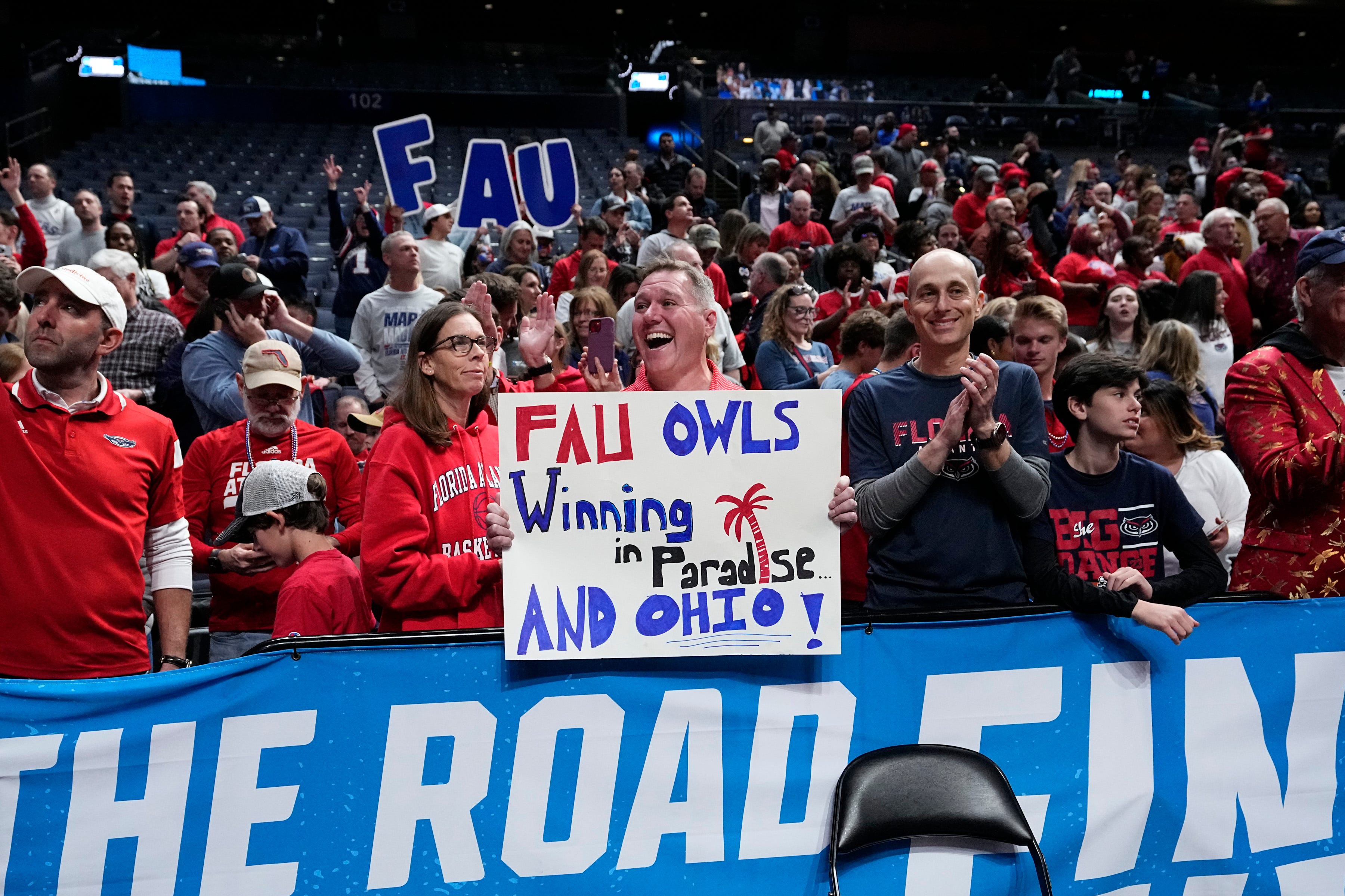 Florida Atlantic Owls fans cheer as their team leaves the court following the 78-70 win over the Fairleigh Dickinson Knights during the second round of the NCAA men s basketball tournament at Nationwide Arena.