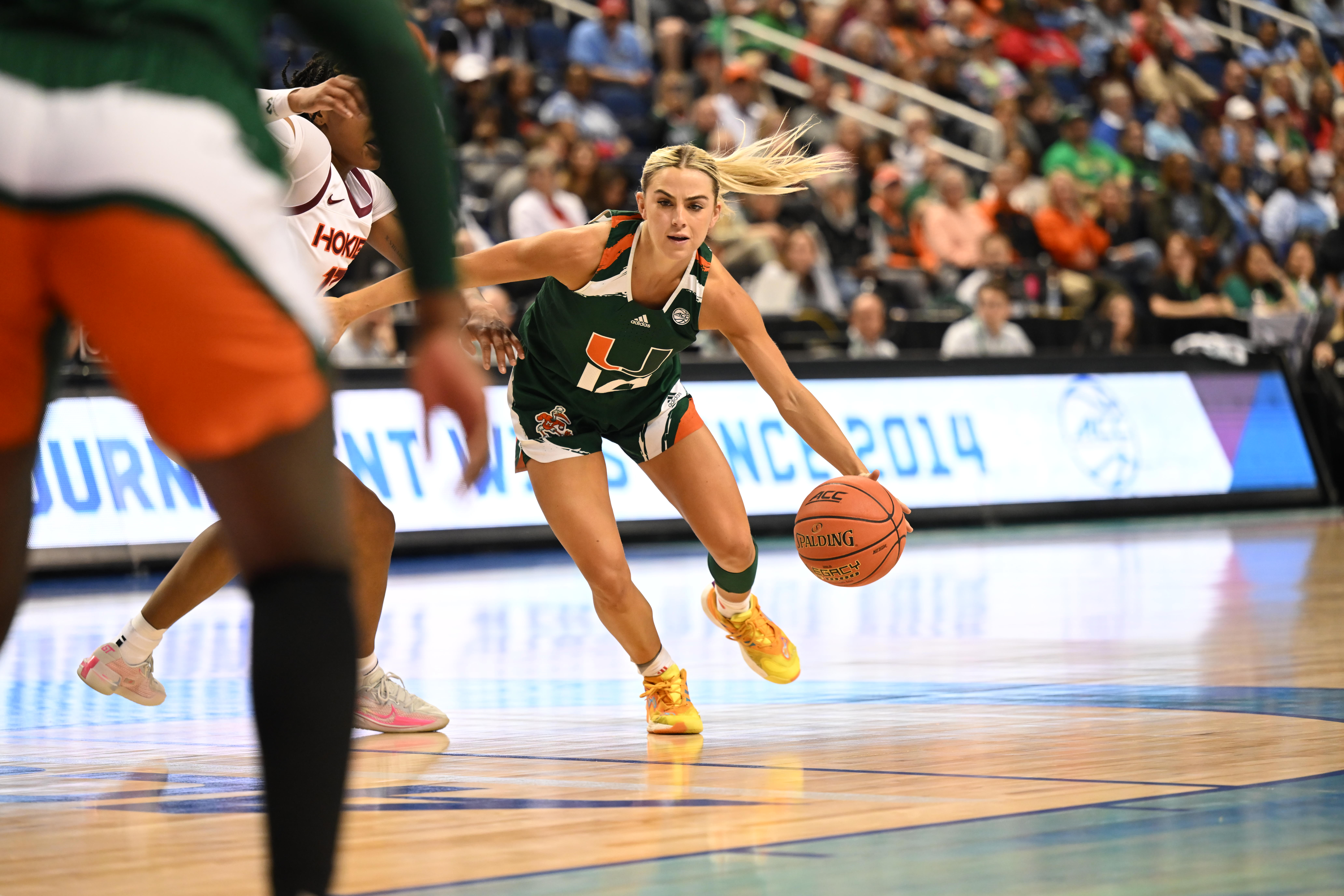 Hurricanes guard Haley Cavinder drives to the lane during the first half at Greensboro Coliseum.