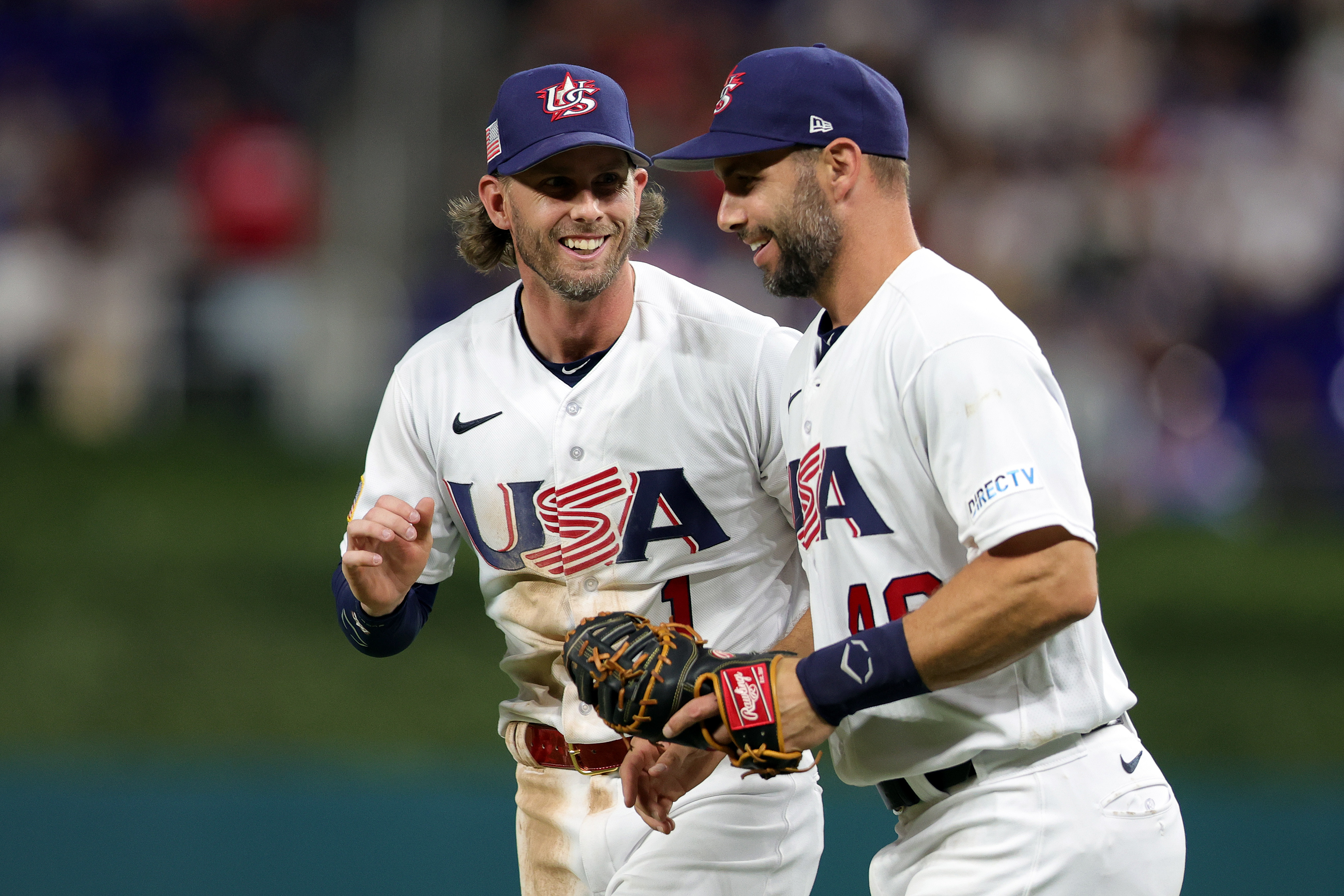 Jeff McNeil #1 speaks with Paul Goldschmidt #46 of Team USA after almost colliding while trying to make a catch against Team Cuba during the World Baseball Classic Semifinals at loanDepot park on March 19, 2023 in Miami, Florida.