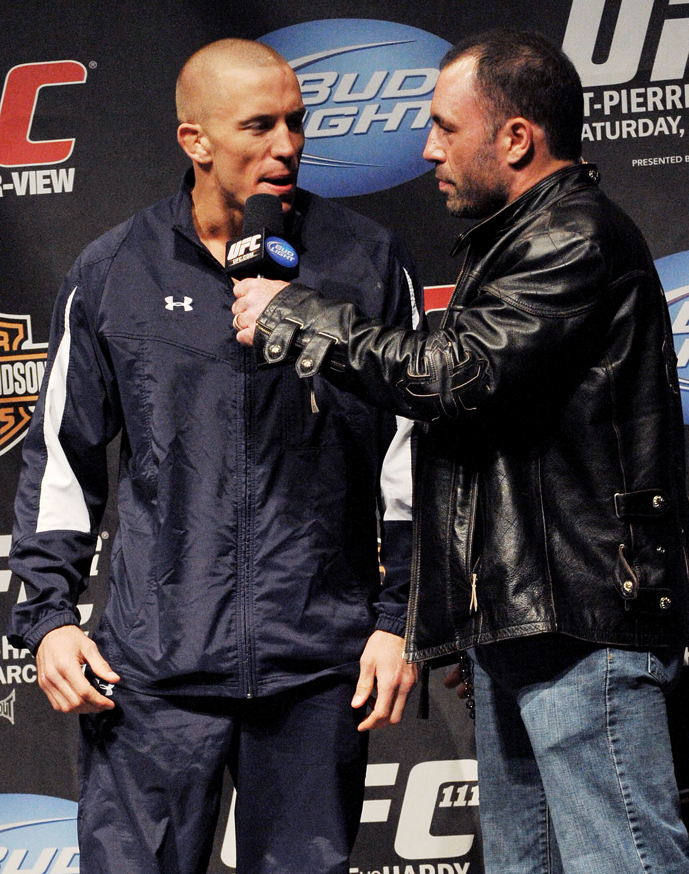 Georges St-Pierre and Joe Rogan conduct an interview during the UFC 111: St-Pierre v Hardy Weigh-In