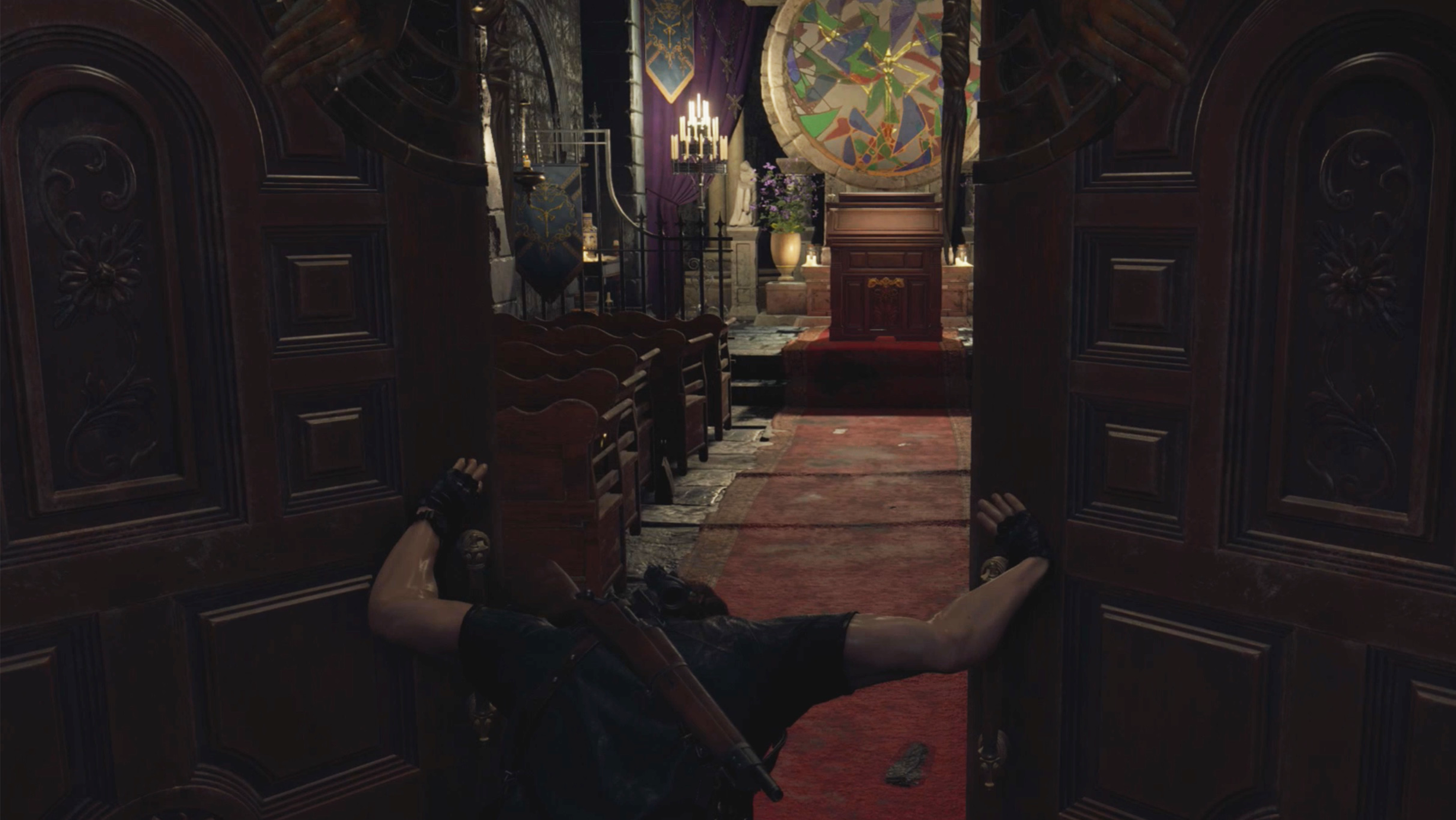 Resident Evil 4&nbsp;remake&nbsp;Leon pushing through the doors into the Church with the stained glass Pulpit puzzle in the background