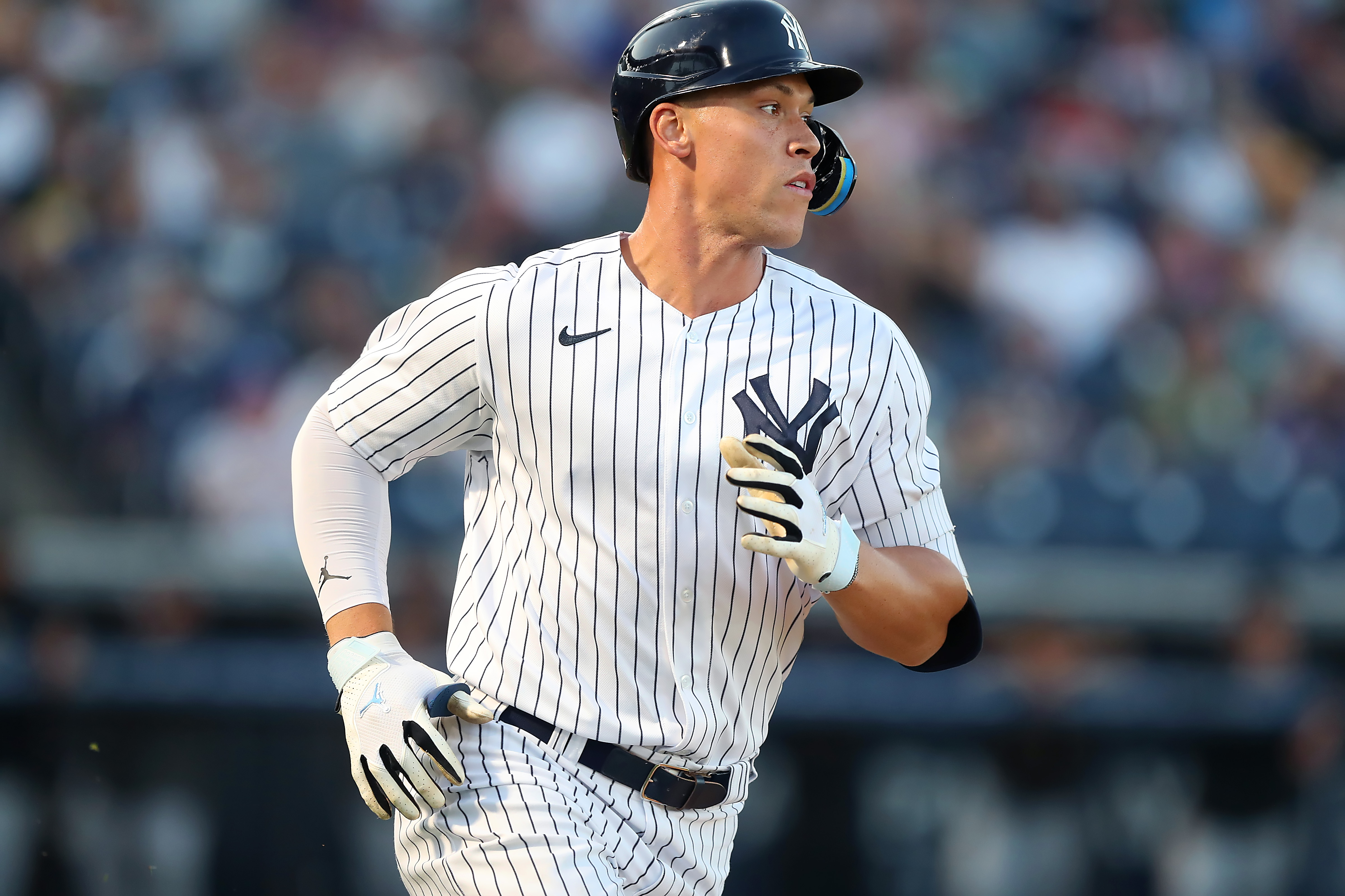 New York Yankees Outfielder Aaron Judge (99) trots to first base during the spring training game between the Pittsburgh Pirates and the New York Yankees on March 16, 2023 at George M. Steinbrenner Field in Tampa, FL.