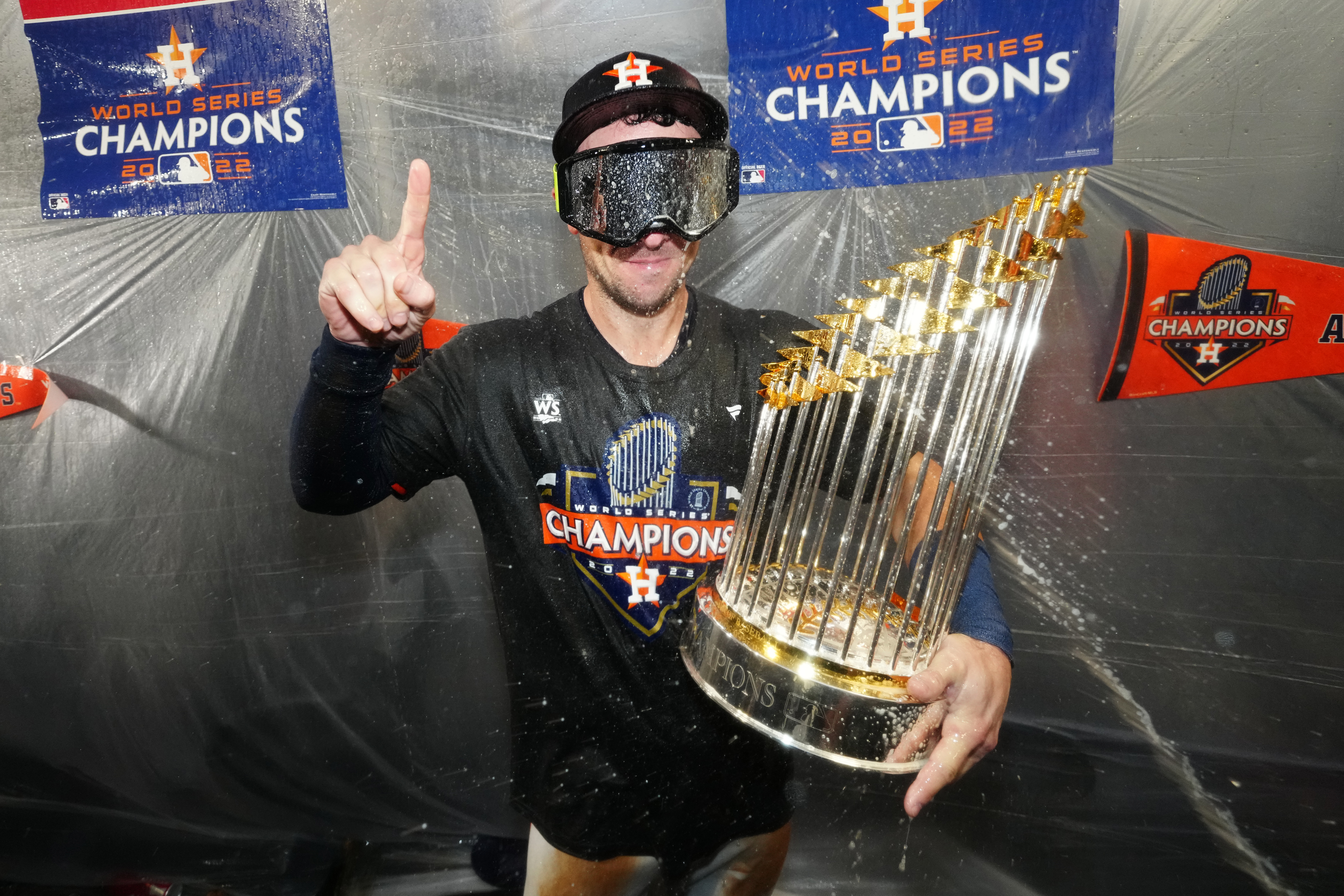 Alex Bregman of the Houston Astros celebrate in the clubhouse after the Astros defeated the Phillies, 4-1, in Game 6 of the 2022 World Series between the Philadelphia Phillies and the Houston Astros at Minute Maid Park on Saturday, November 5, 2022 in Houston, Texas.