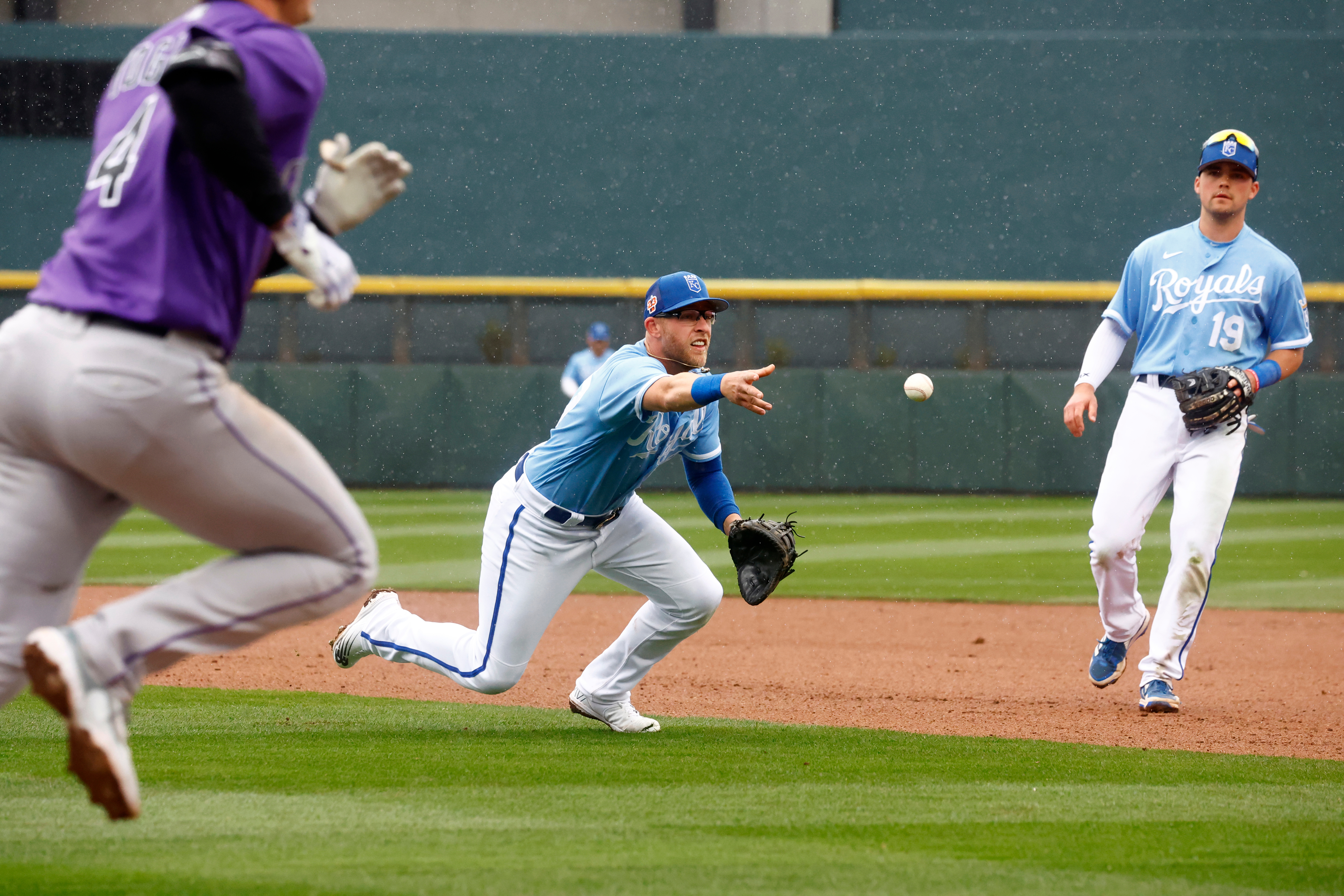 Matt Beaty (27) of the Kansas City Royals tosses the ball to first base during Big League Weekend featuring the Colorado Rockies versus the Kansas City Royals on March 19, 2023 at Las Vegas Ballpark in Las Vegas, Nevada.
