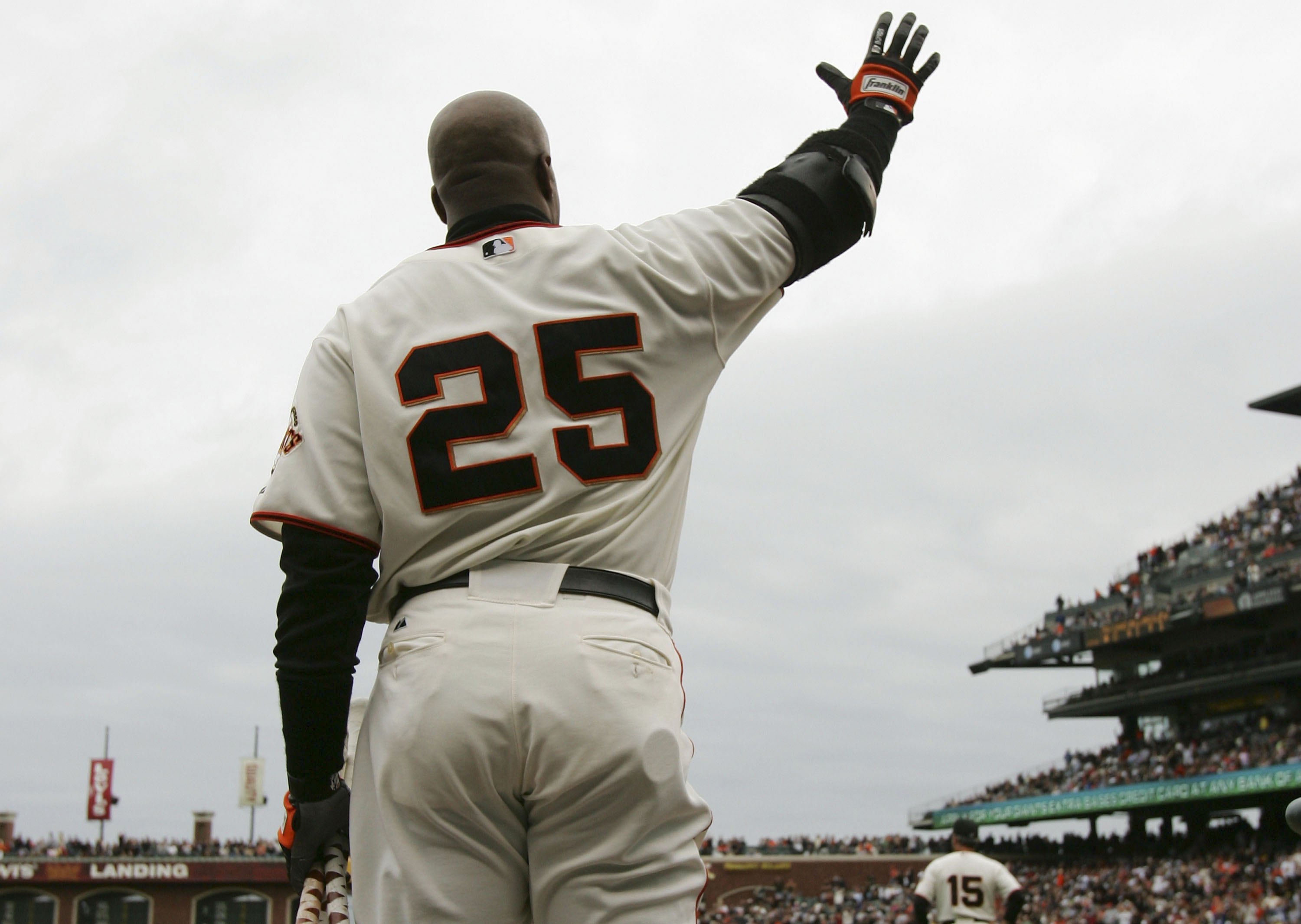 View from behind of Barry Bonds waving to the crowd