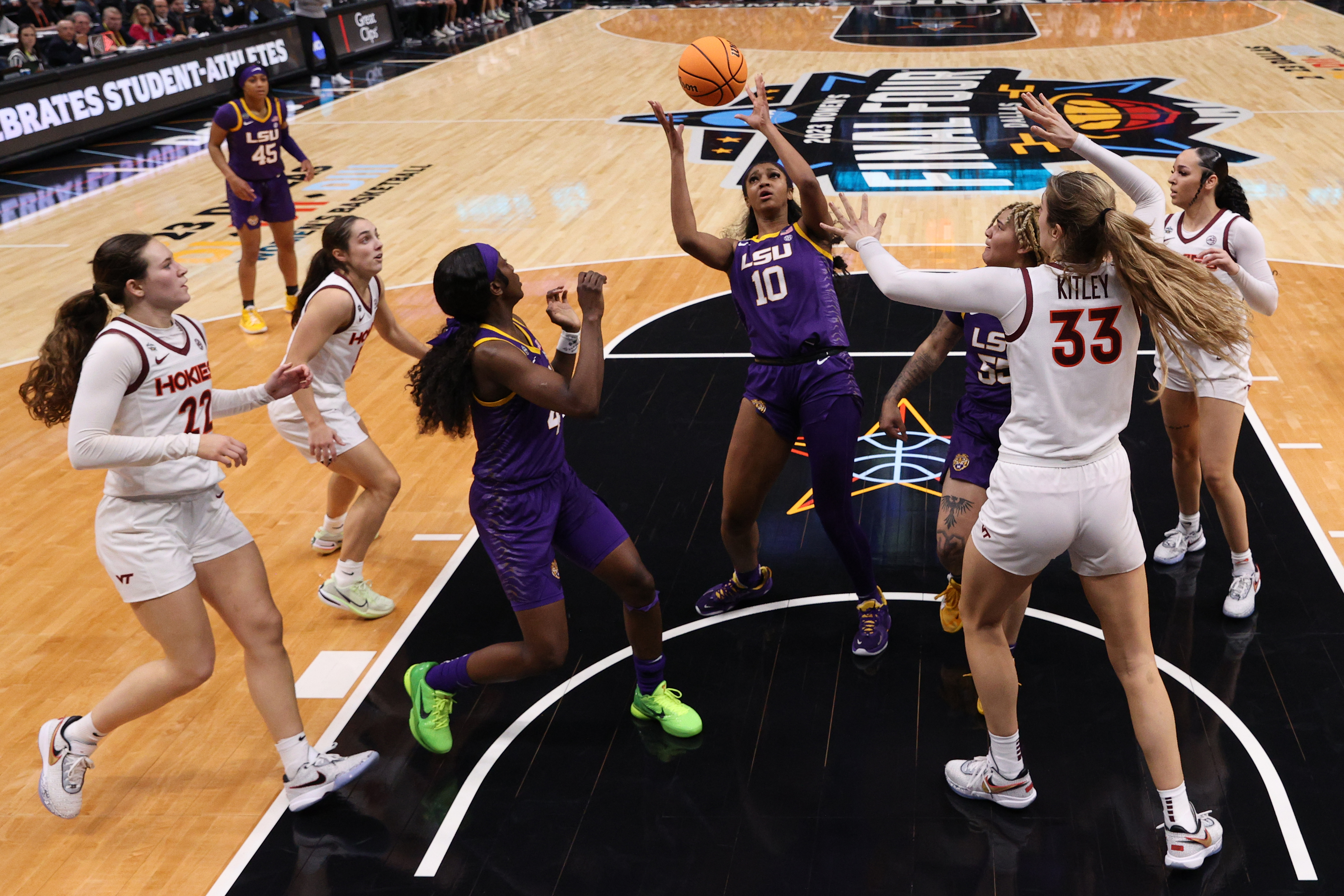 Angel Reese #10 of the LSU Lady Tigers receives a pass in the lane during the fourth quarter against the Virginia Tech Hokies during the 2023 NCAA Women’s Basketball Tournament Final Four semifinal game at American Airlines Center on March 31, 2023 in Dallas, Texas.