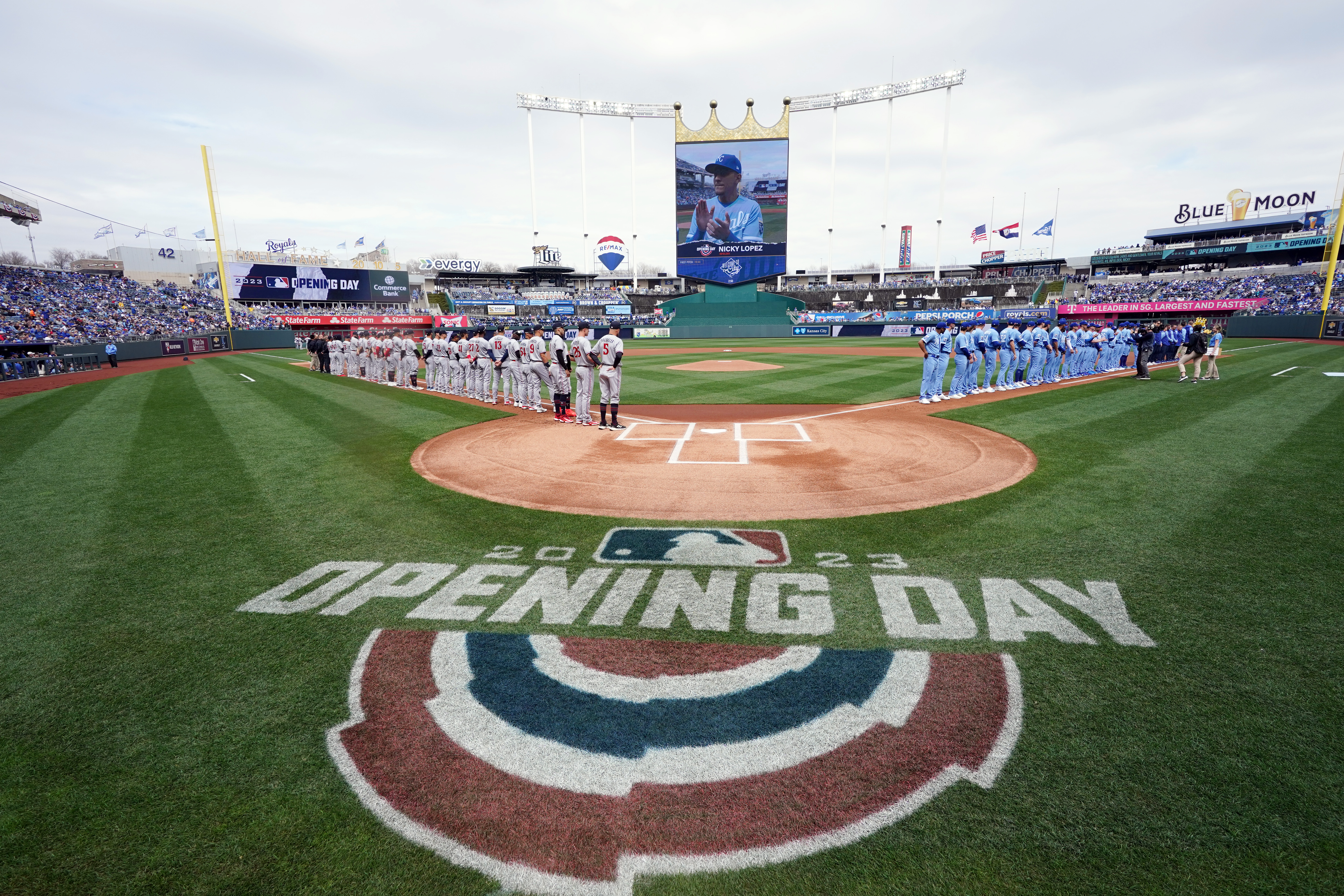 Picture of the grass behind home plate painted, “Opening Day!”