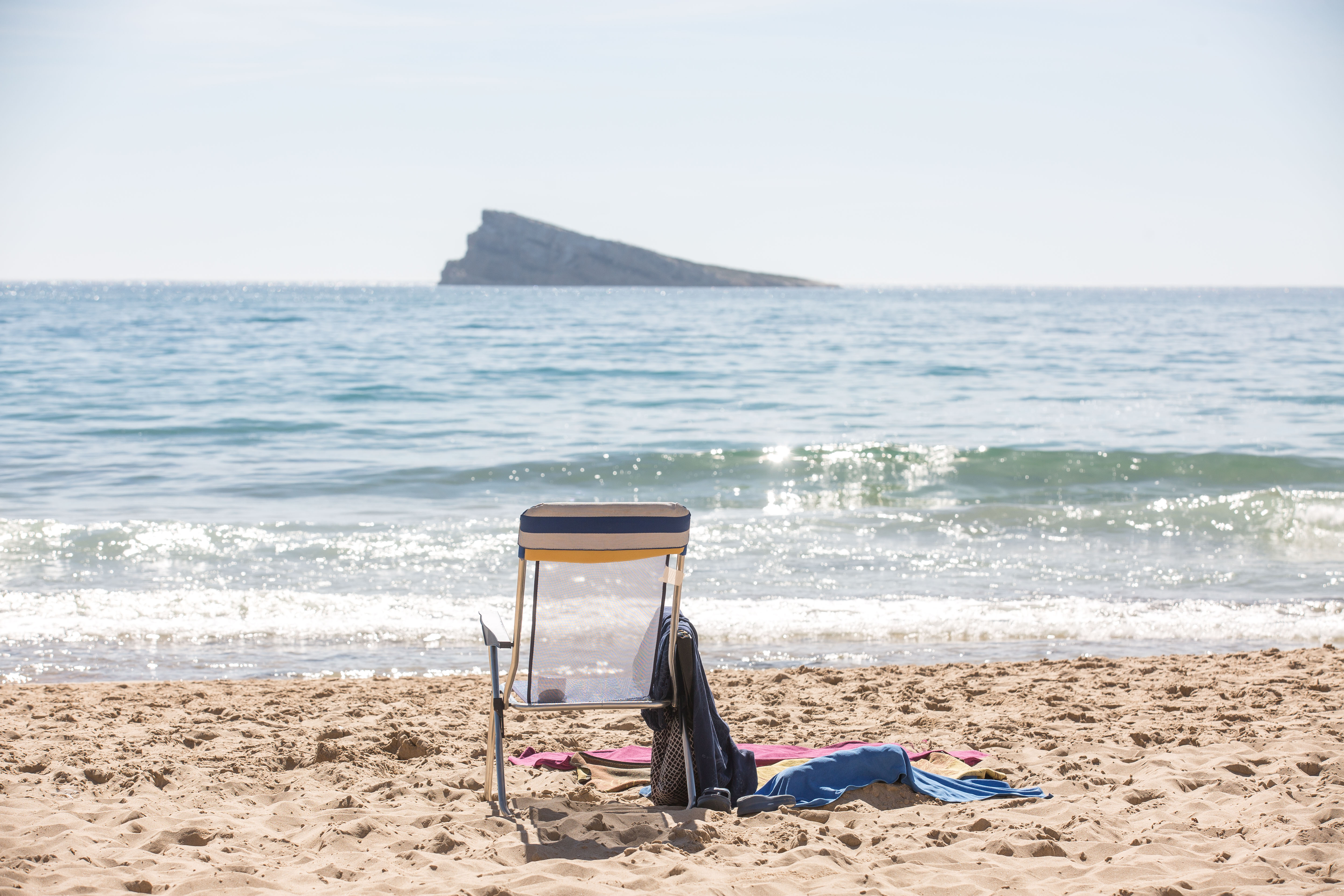Bathers Visit The Beaches Of Benidorm After The Rise In Temperatures .