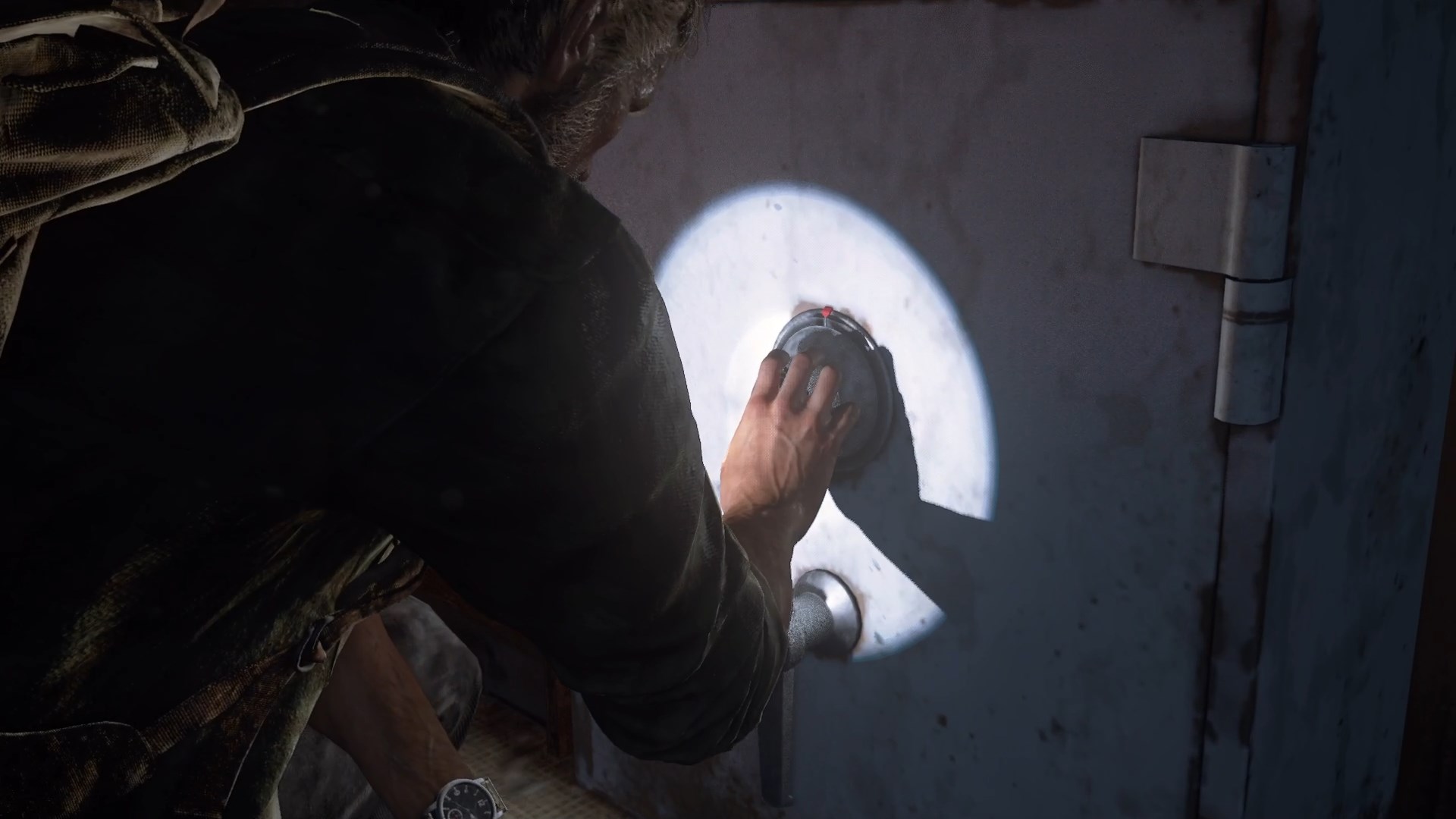 Joel opening a safe in The Last of Us Part 1