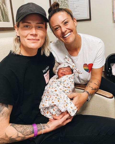 Mommies Ashlyn Harris and Ali Krieger and their adopted baby girl Sloane.