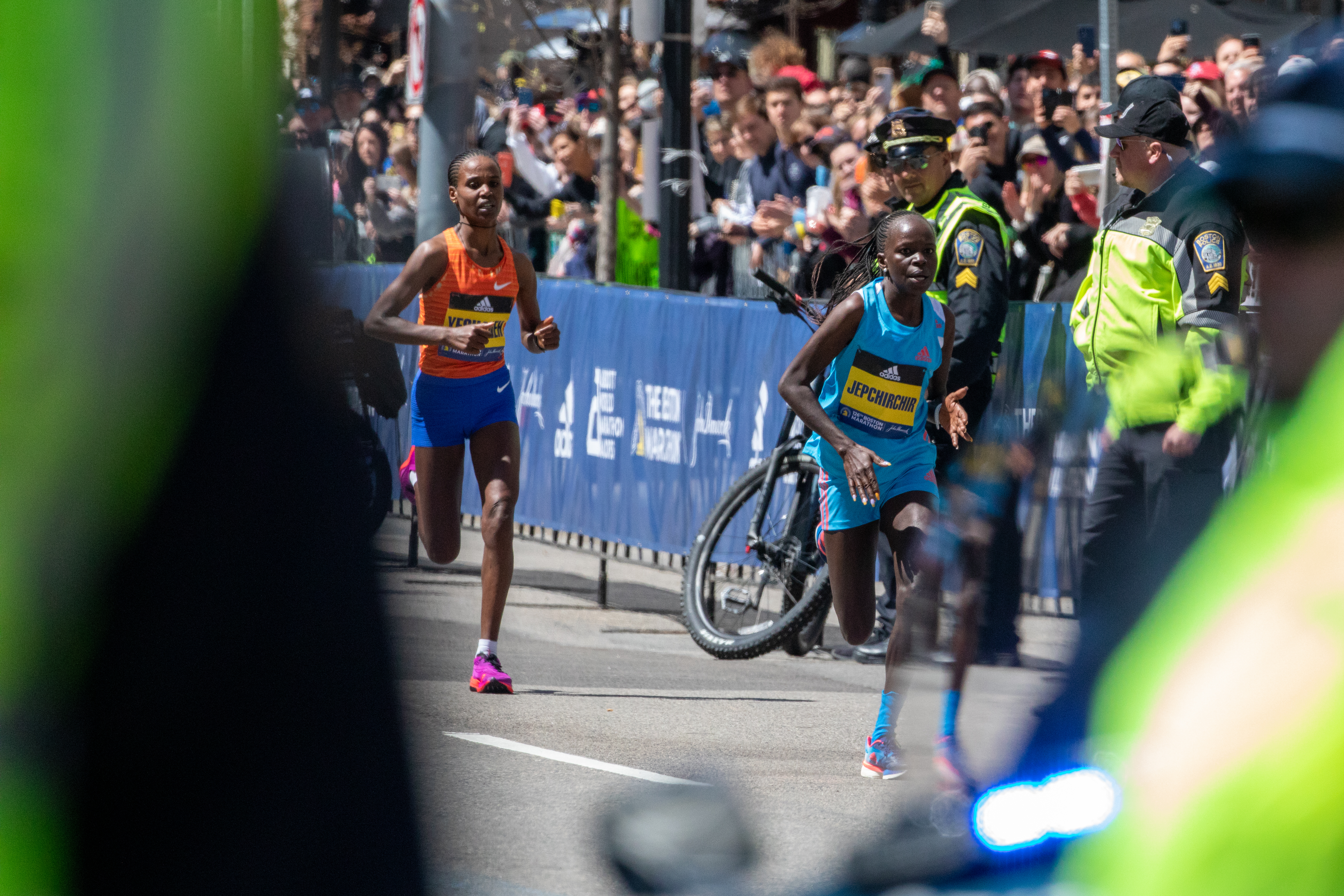 Peres Jepchirchir from Kenya, races and wins first place in the Womenâs elite division at the 126 Boston Marathon on April 18, 2022 in Boston, Massachusetts, United States. The 26.2-mile race returns to Patriotsâ Day this year for the first time in three years, since the start of the pandemic and brings 30,000 athletes, including runners from 122 countries and all 50 U.S. states to the Commonwealth.