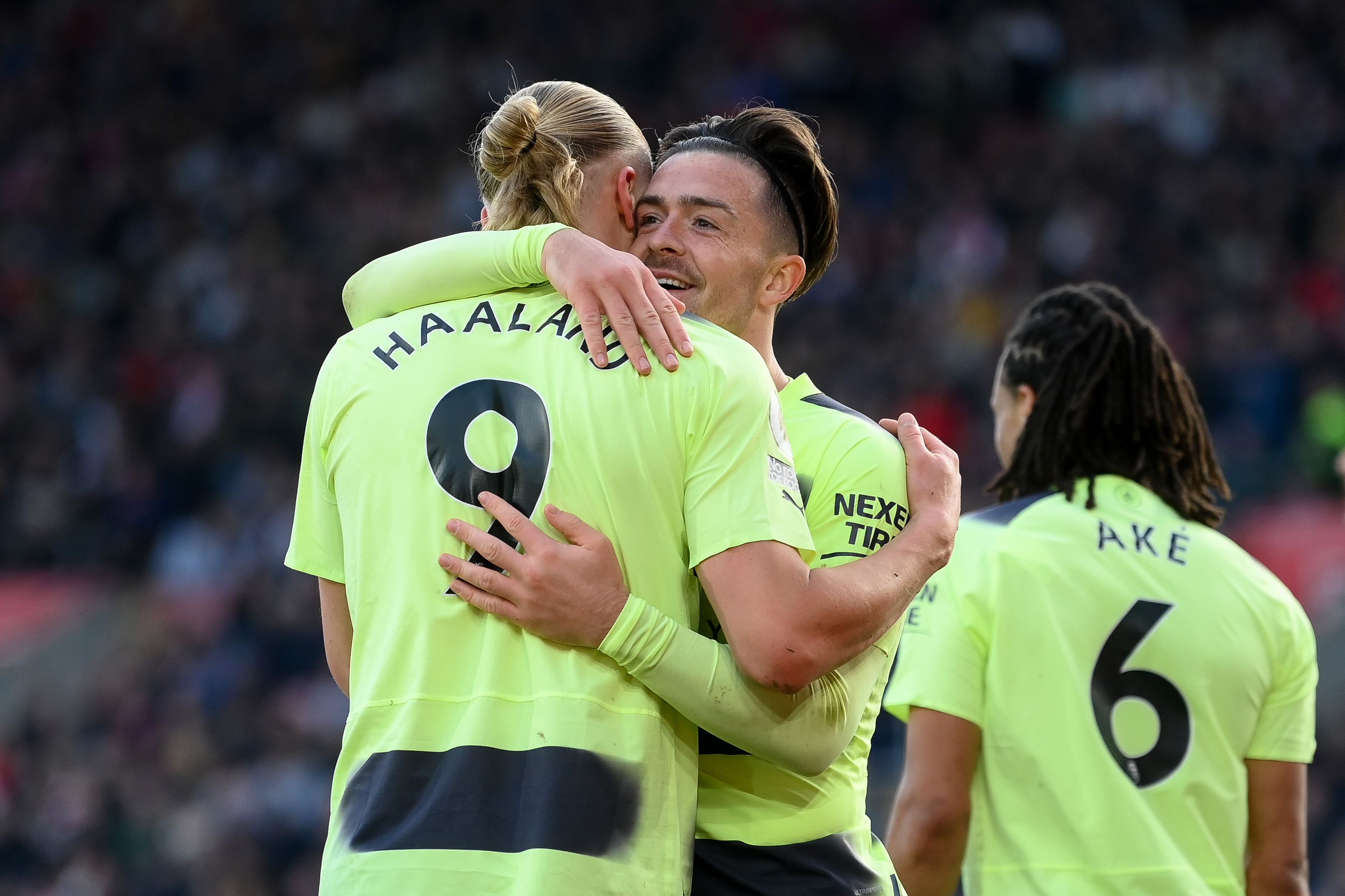 Erling Haaland celebrates with teammate Jack Grealish — Manchester City — Premier League
