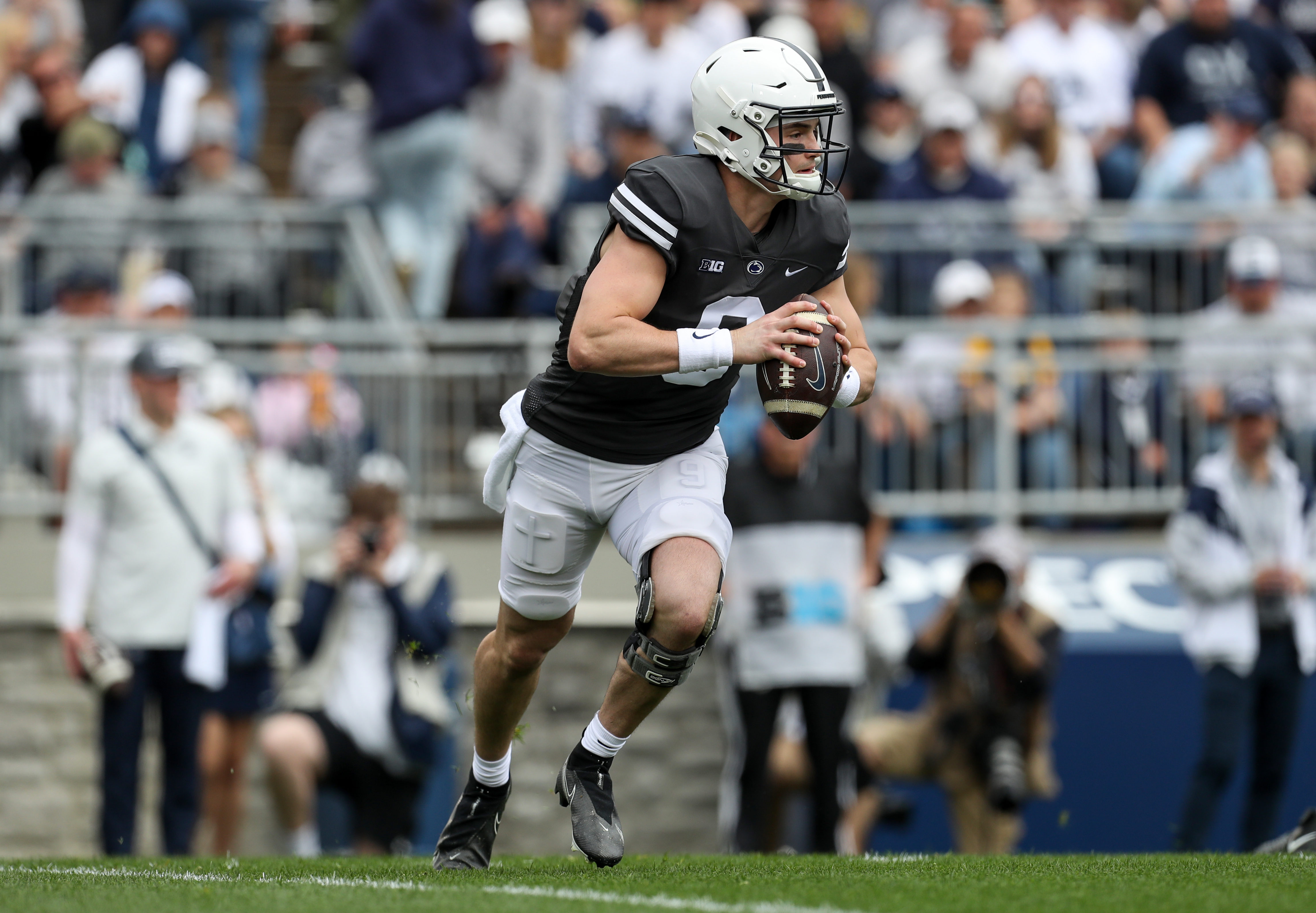 Apr 15, 2023; University Park, PA, USA; Penn State Nittany Lions quarterback Beau Pribula (9) runs with the ball during the first quarter of the Blue White spring game at Beaver Stadium.&nbsp;