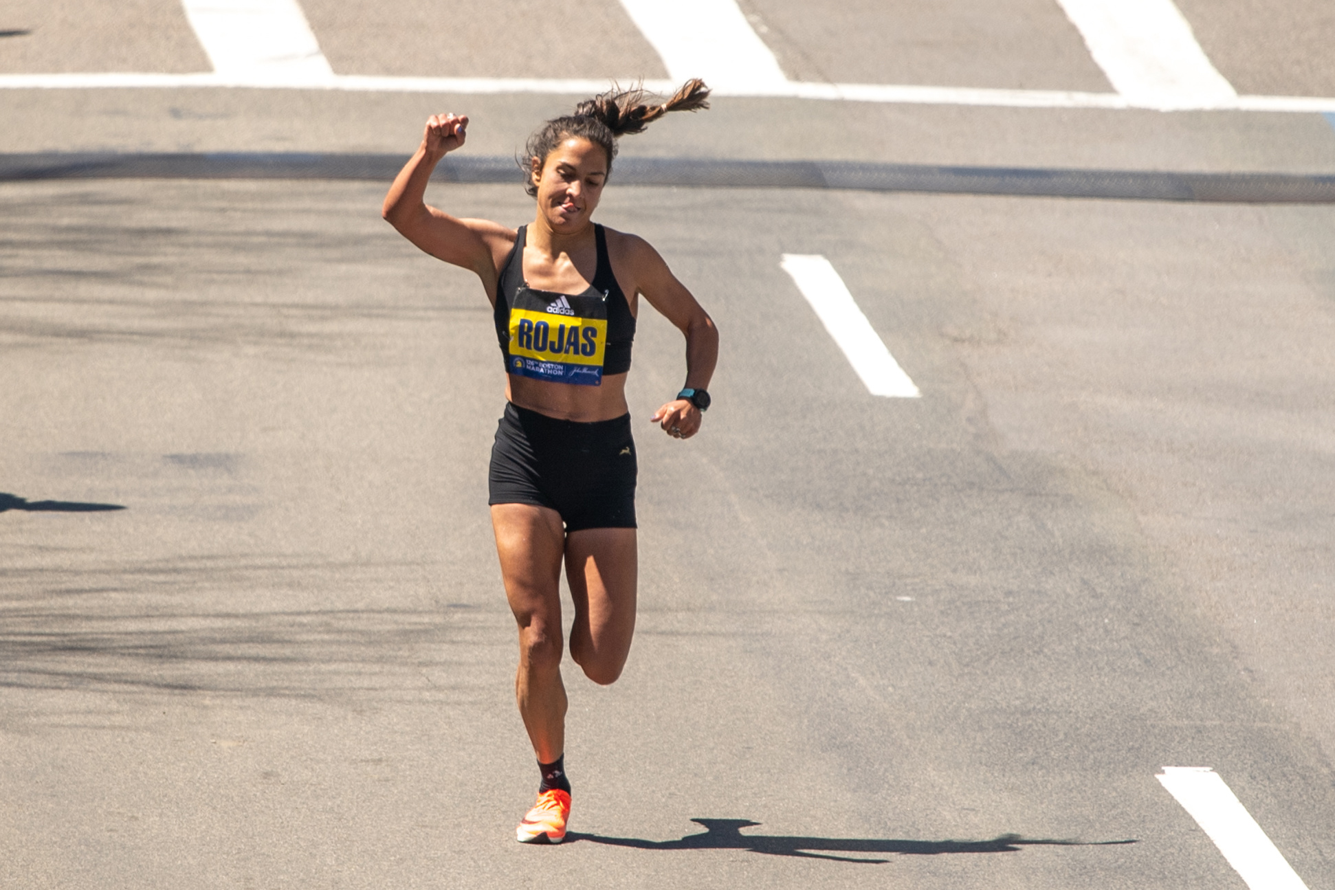 Nell Rojas of the United States gestures as she sprints toward the finish line of the Boston Marathon on April 18, 2022 on Boylston Street in Boston, MA.  &nbsp;   