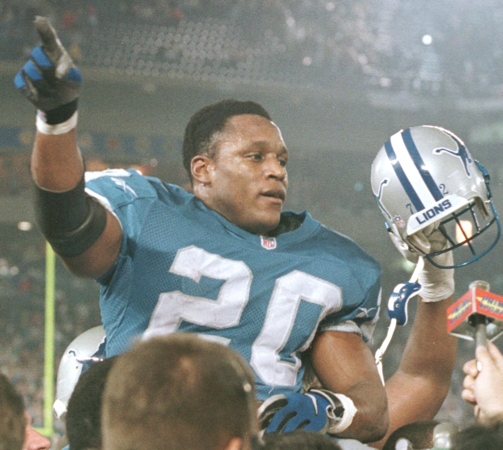 Detroit Lions running back Barry Sanders is carrie
