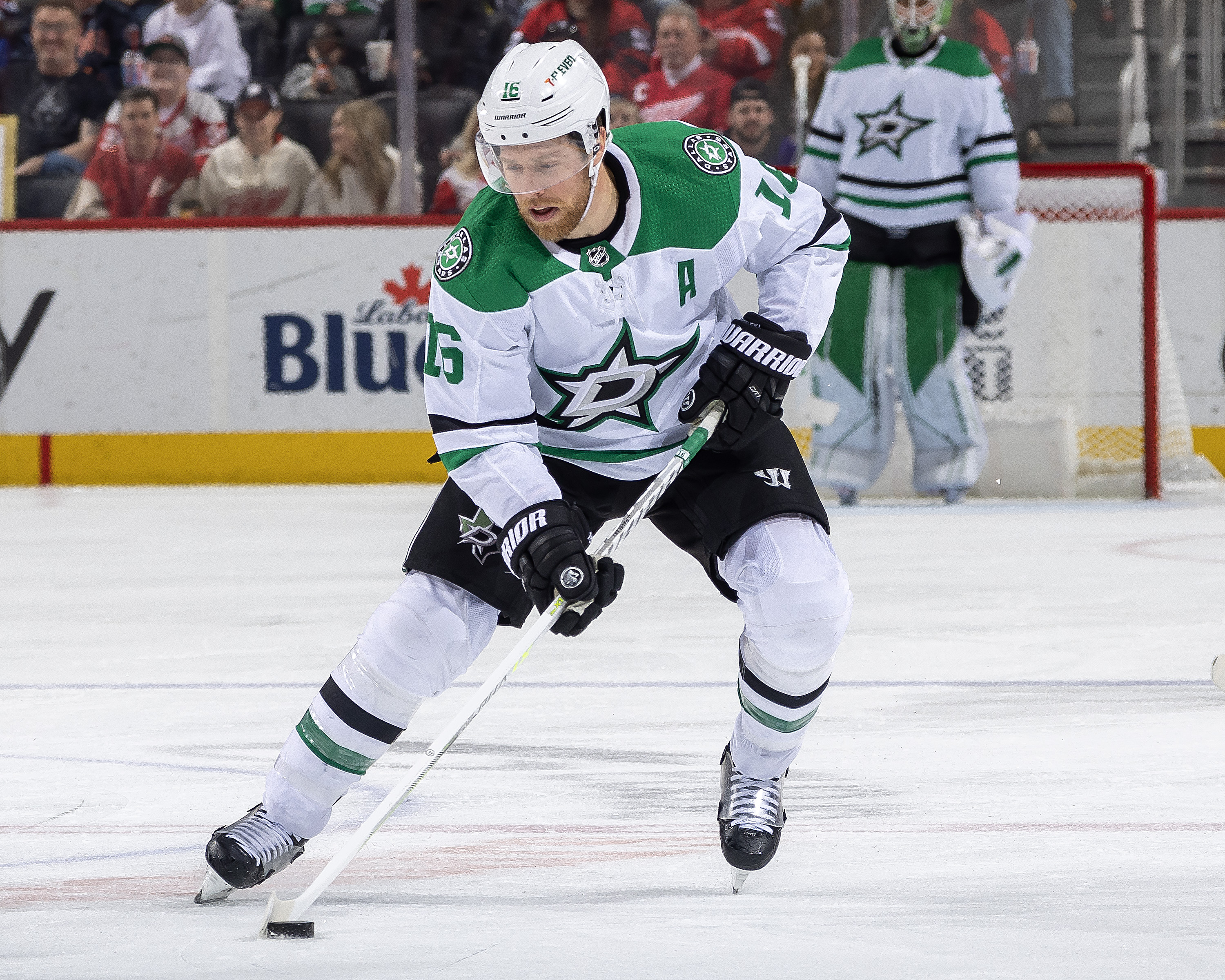 Joe Pavelski of the Dallas Stars skates up ice with the puck against the Detroit Red Wings during the second period of an NHL game at Little Caesars Arena on April 10, 2023 in Detroit, Michigan. Dallas defeated Detroit 6-1.