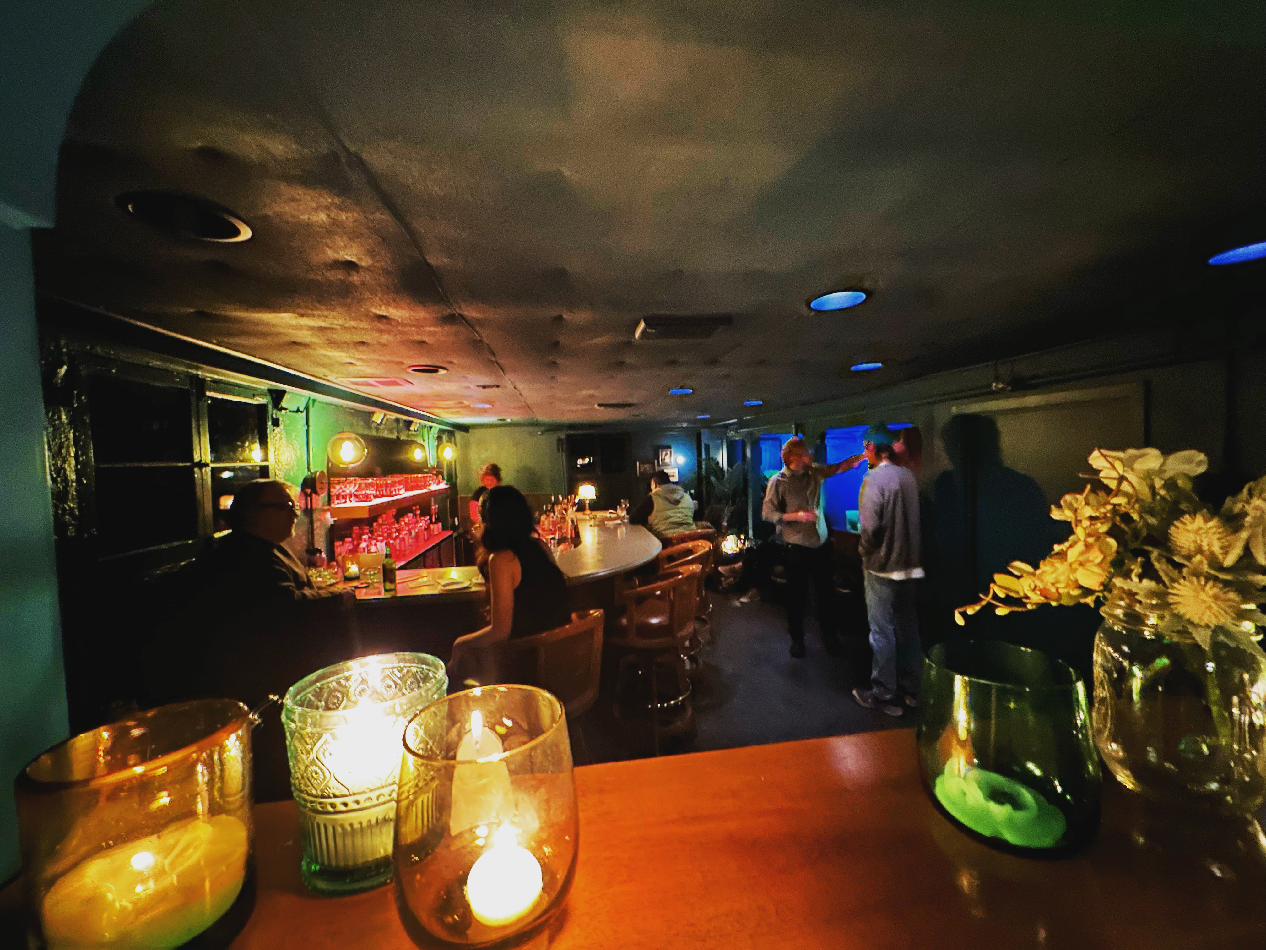 The candlelit interior of Northwest Portland cocktail bar Grandma’s Secret.