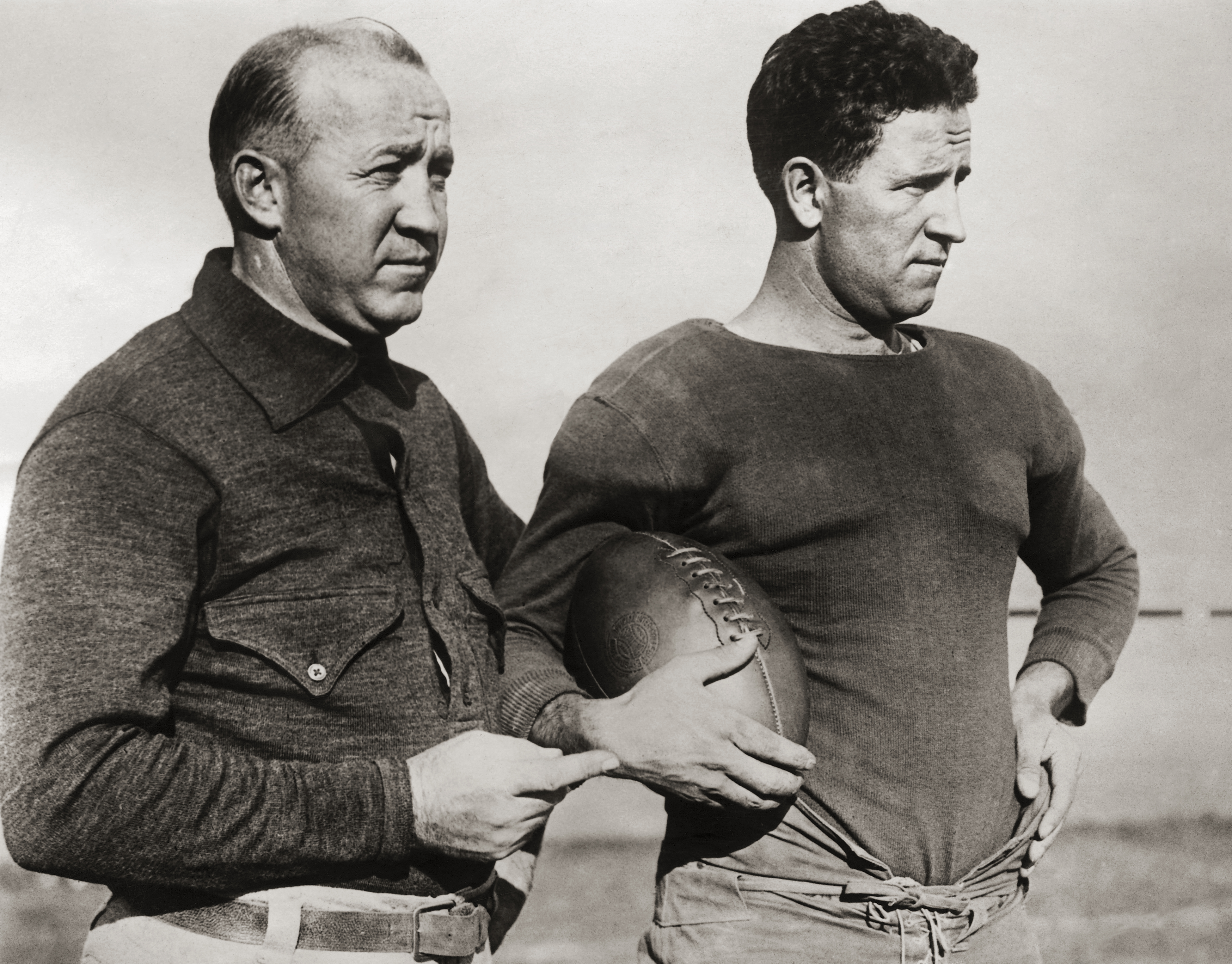 Notre Dame Coach Knute Rockne Standing with Team Captain
