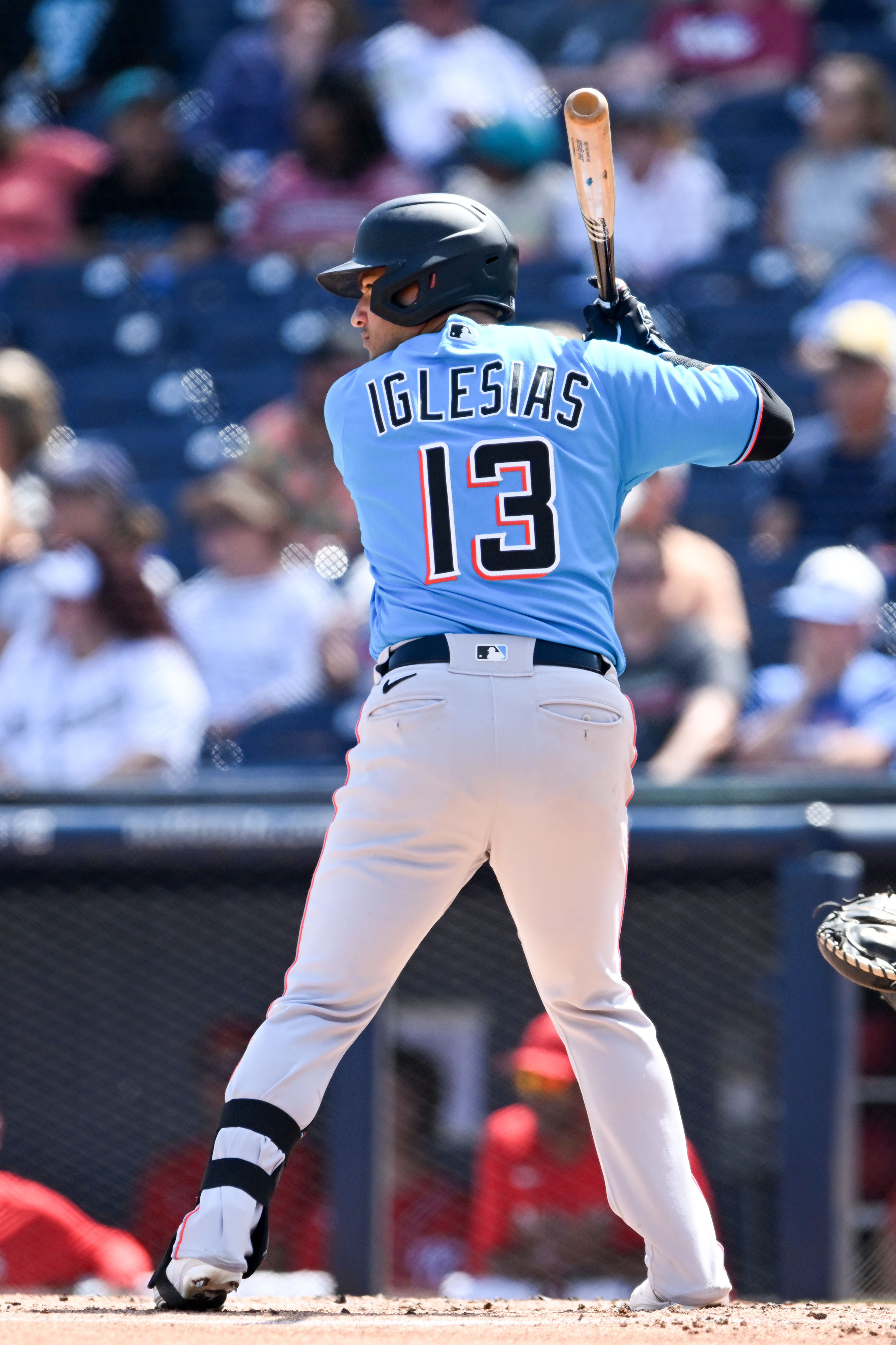 José Iglesias #13 of the Miami Marlins bats during the second inning of a spring training game against the Washington Nationals at The Ballpark of the Palm Beaches on March 18, 2023 in West Palm Beach, Florida.