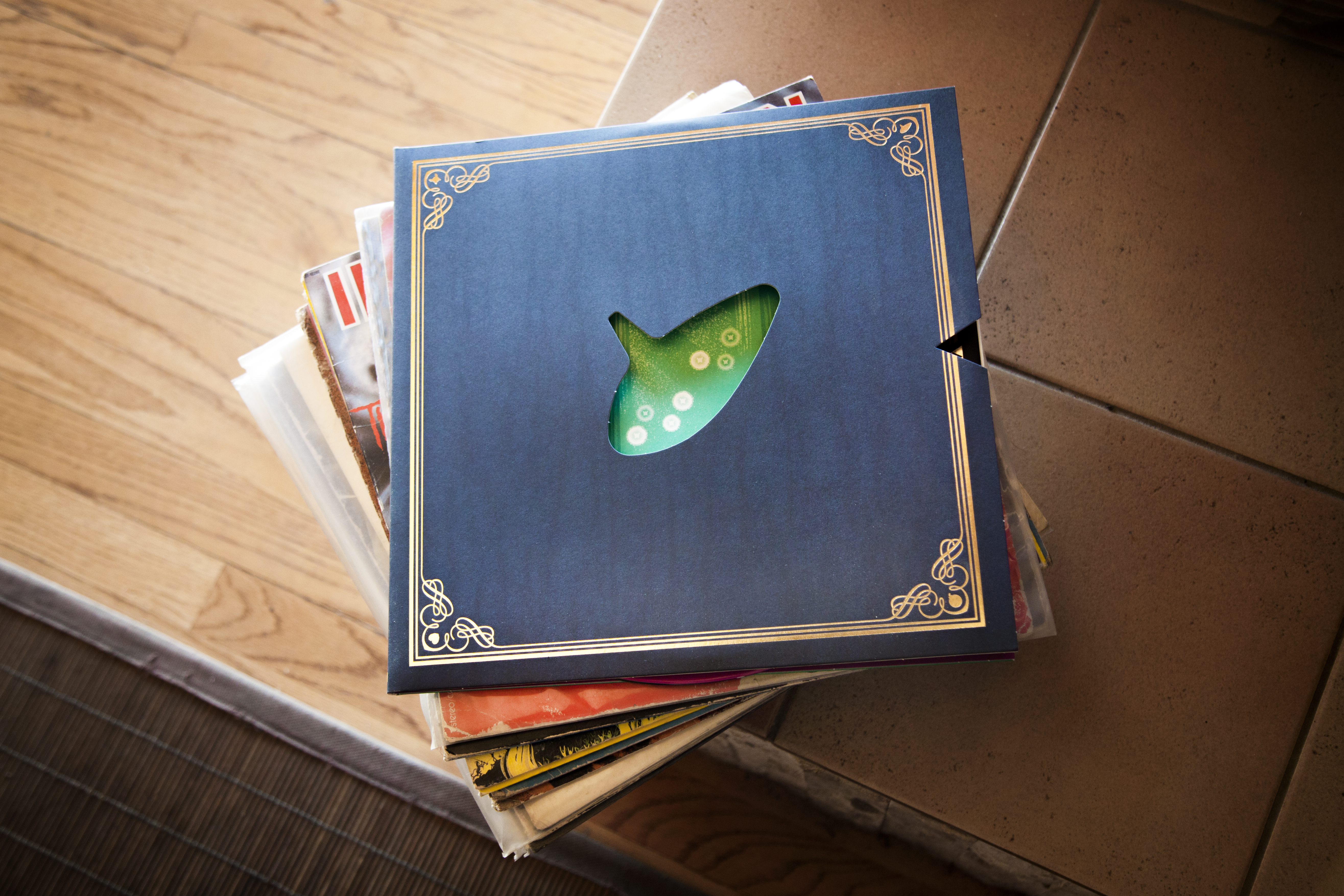 A vinyl for Koji Kondo’s Hero of Time atop a stack of other Zelda vinyl records
