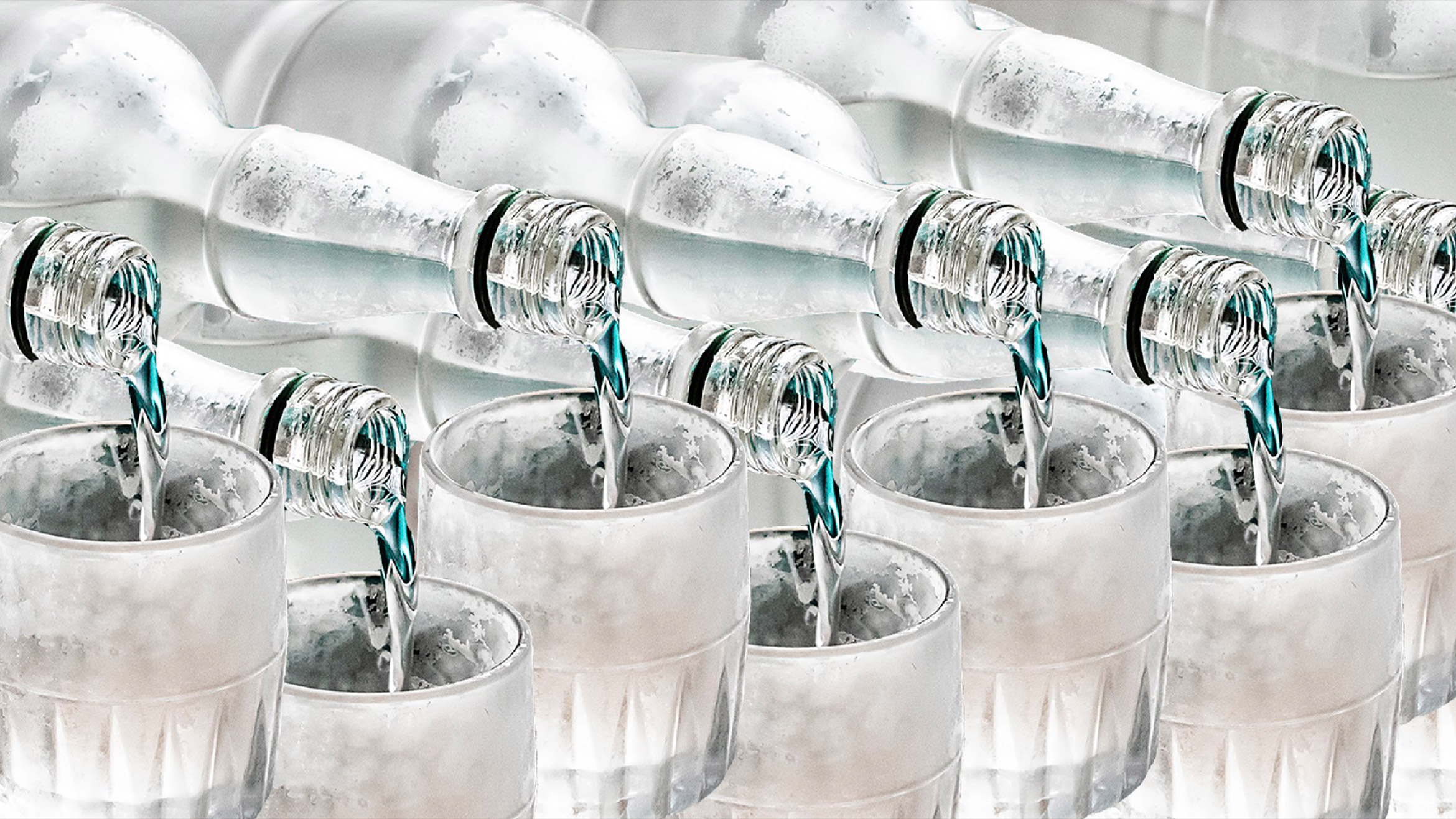 Frosty bottles pouring into glasses