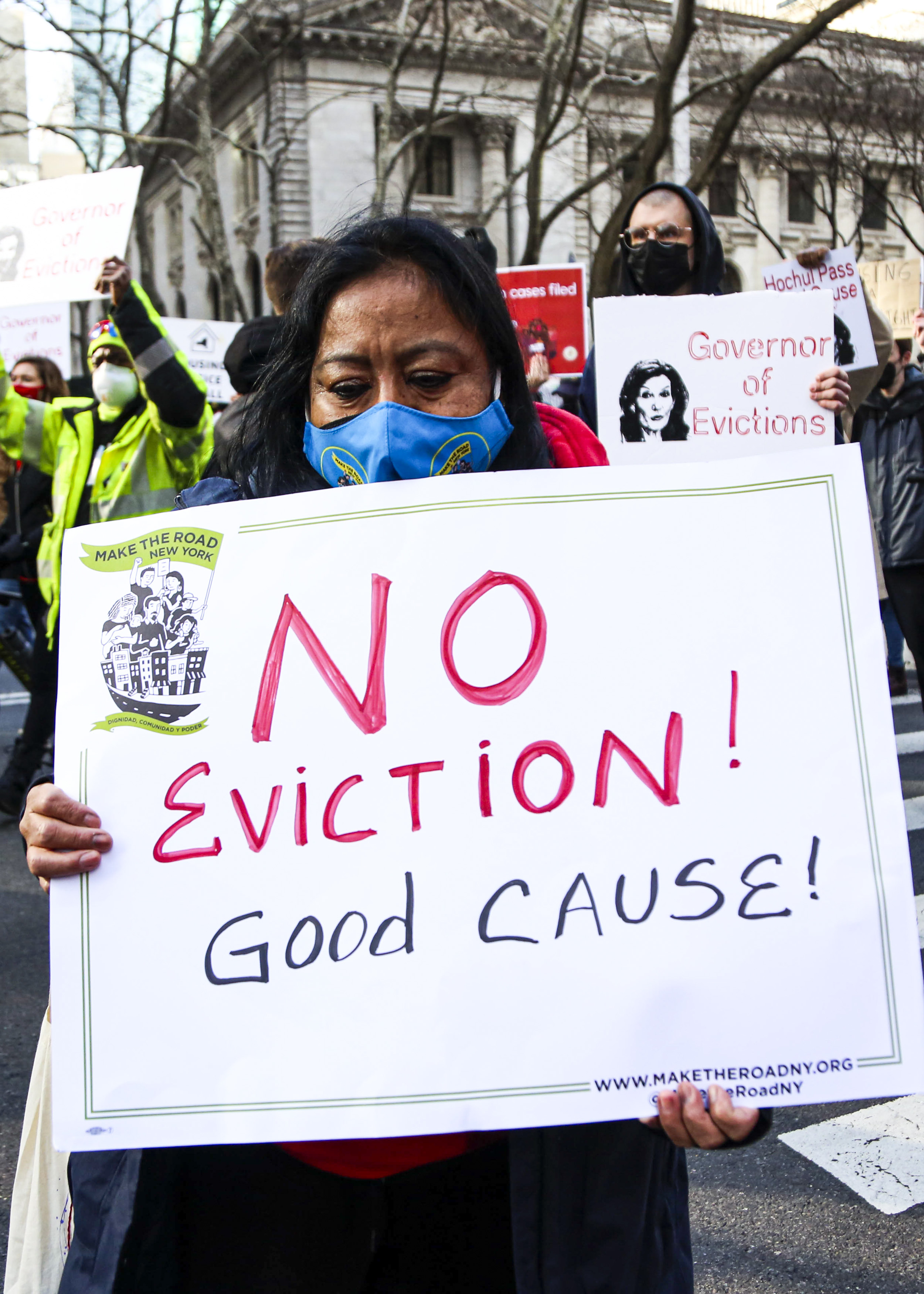 A protester holds a sign that reads “No eviction! Good cause!” at a housing justice march in New York City.