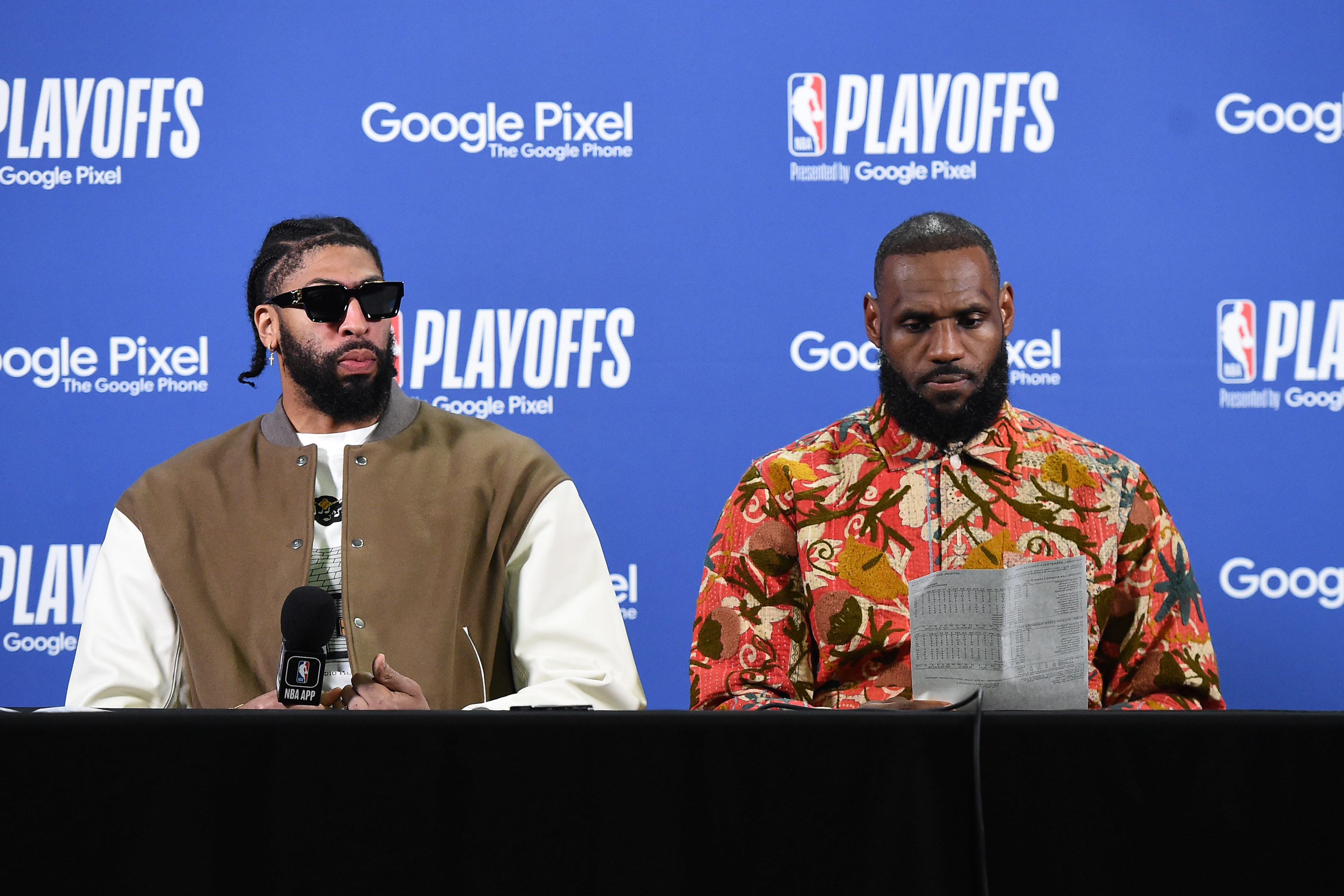LeBron James and Anthony Davis at the podium after Game 1 against the Warriors