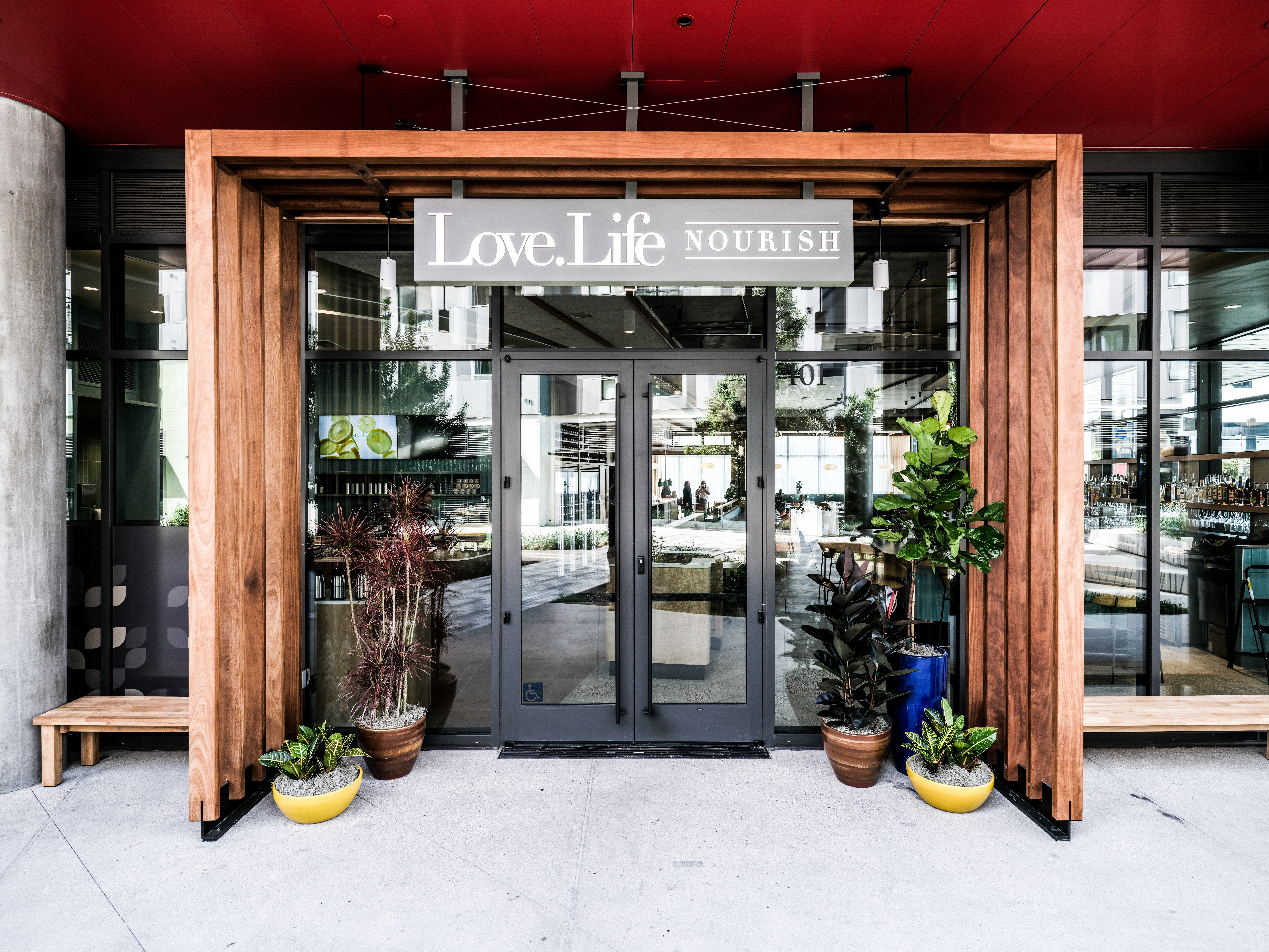 An entry with a wooden frame at Love Life restaurant in Culver City.