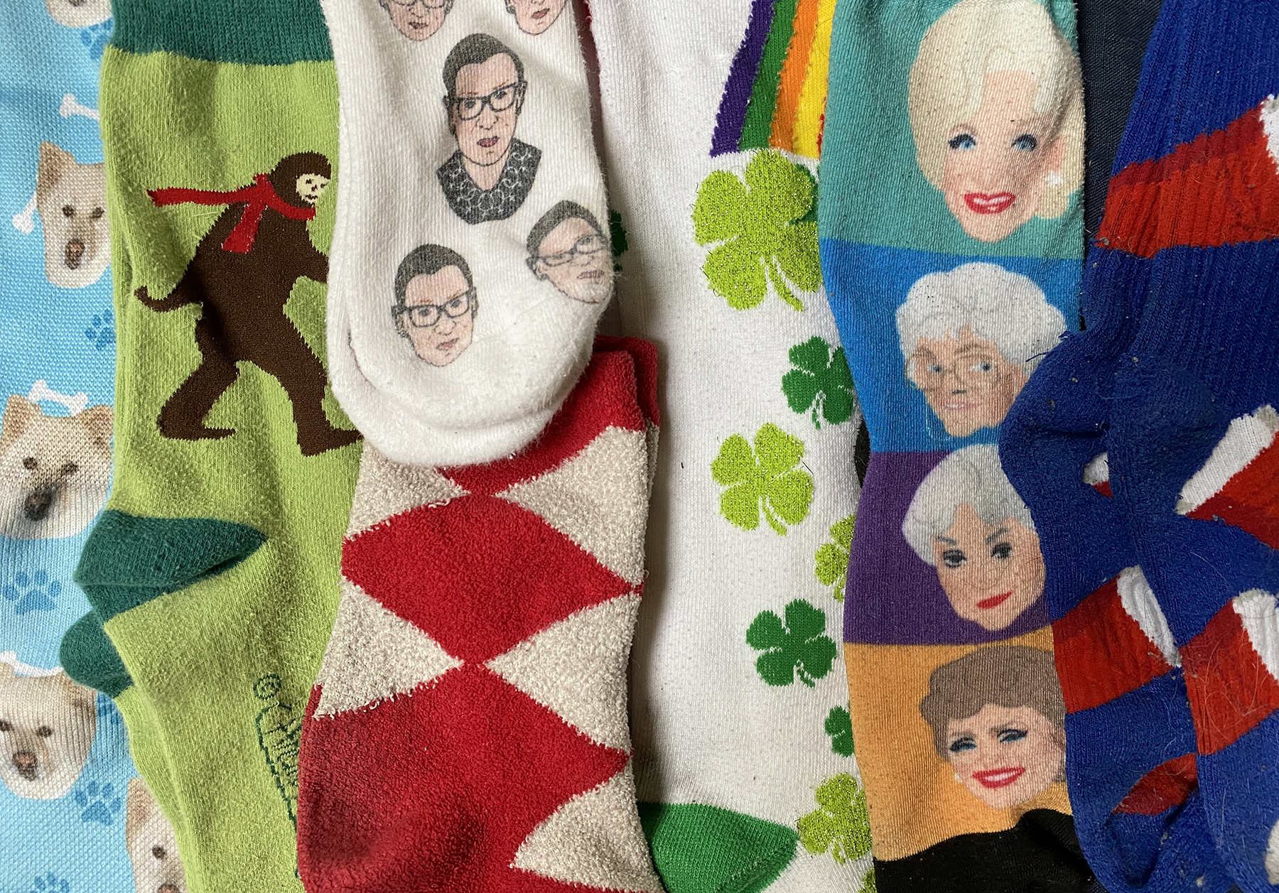 Novelty socks such as Solo cups, Golden Girls, Big Foot, and Maura McGurk’s dog.