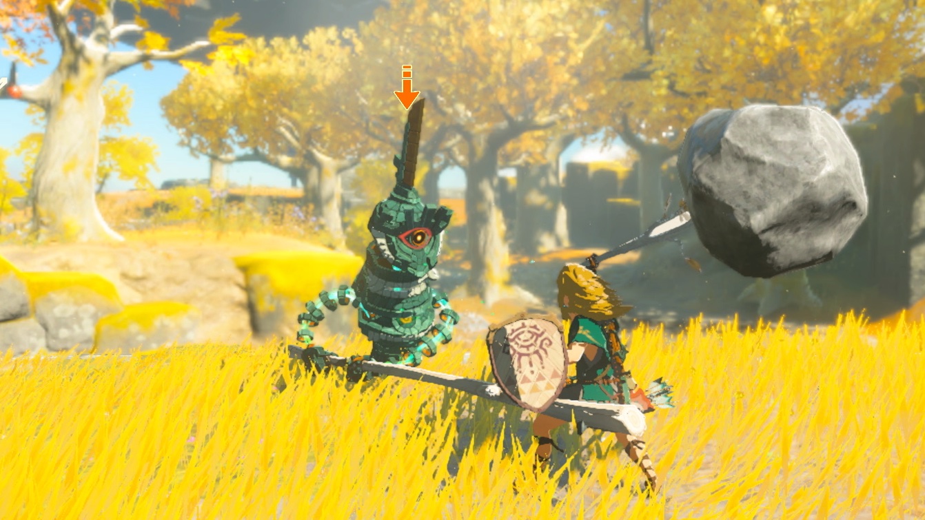 Link smacks a Construct with a Fused weapon in Zelda Tears of the Kingdom.