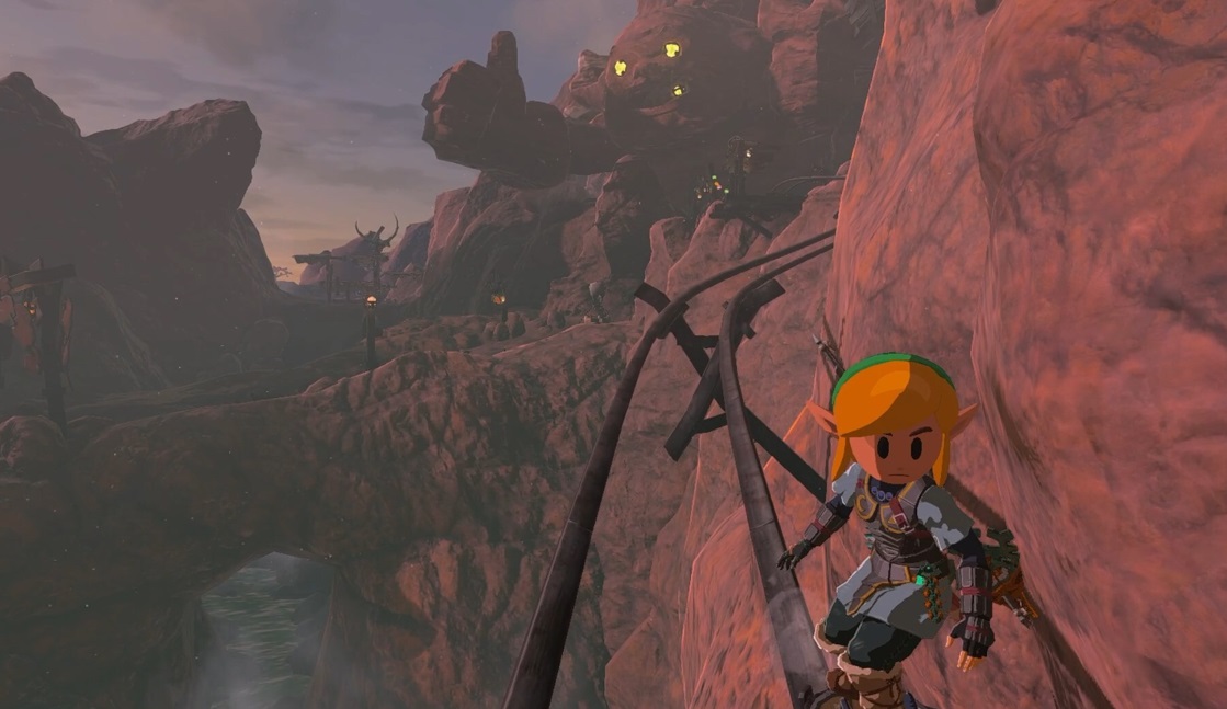 Link, wearing the Fierce Deity armor and Link’s Awakening head, grinds a sick rail in The Legend of Zelda: Tears of the Kingdom