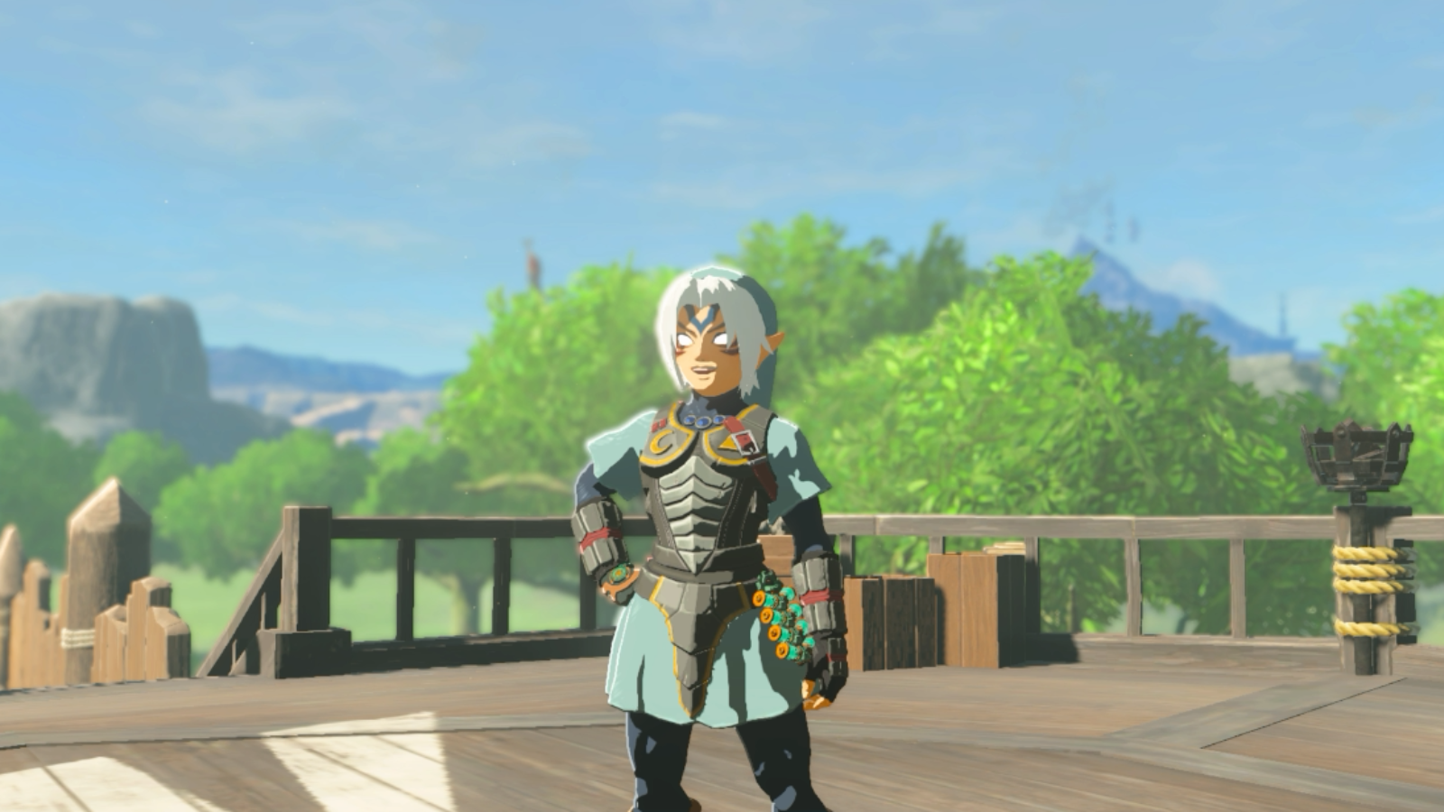 Link wearing the Fierce Deity armor set on top of the balcony of Lookout Landing in The Legend of Zelda: Tears of the Kingdom
