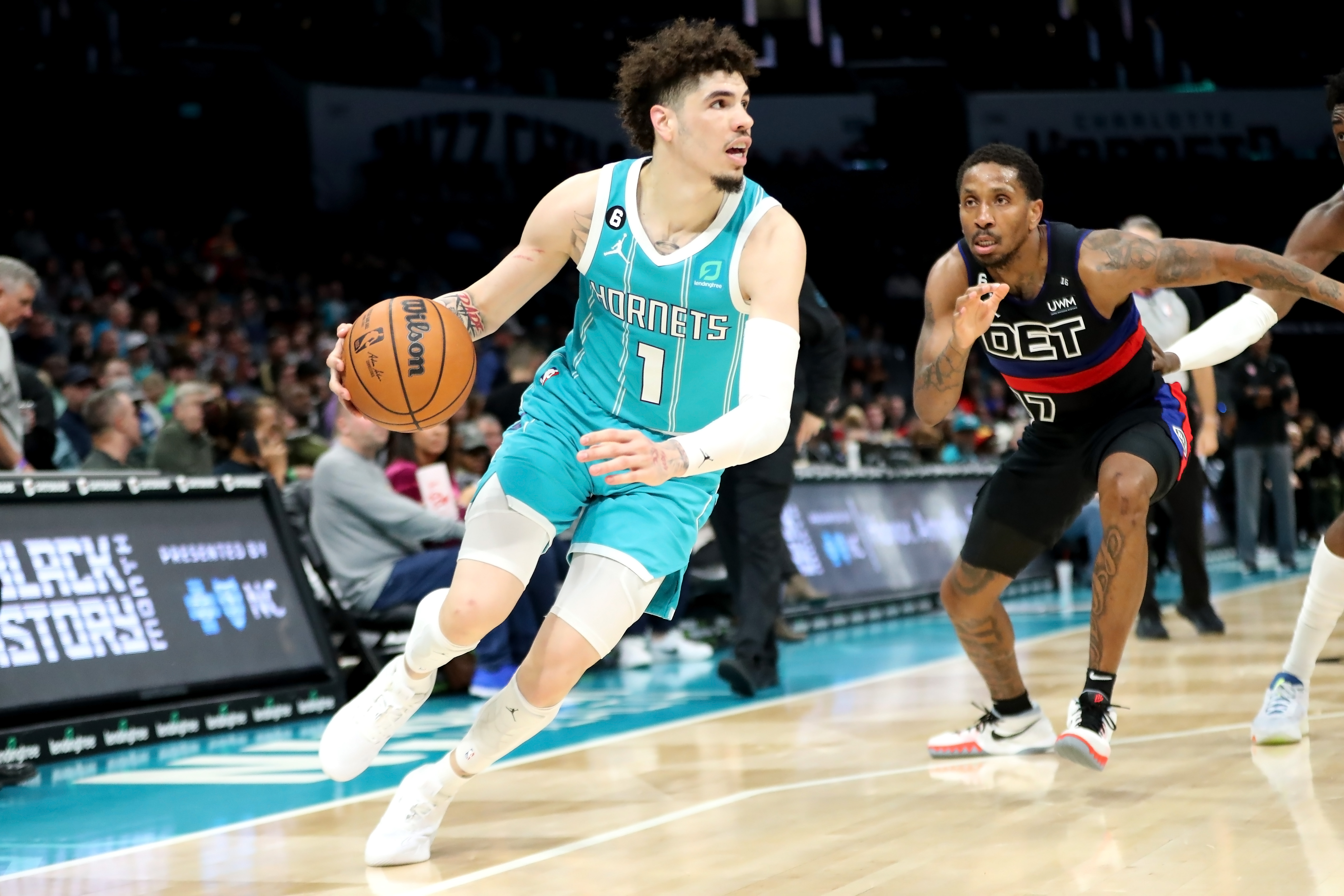 CHARLOTTE, NORTH CAROLINA - FEBRUARY 27: LaMelo Ball #1 of the Charlotte Hornets drives to the basket during the second half of their basketball game against the Detroit Pistons at Spectrum Center on February 27, 2023 in Charlotte, North Carolina.