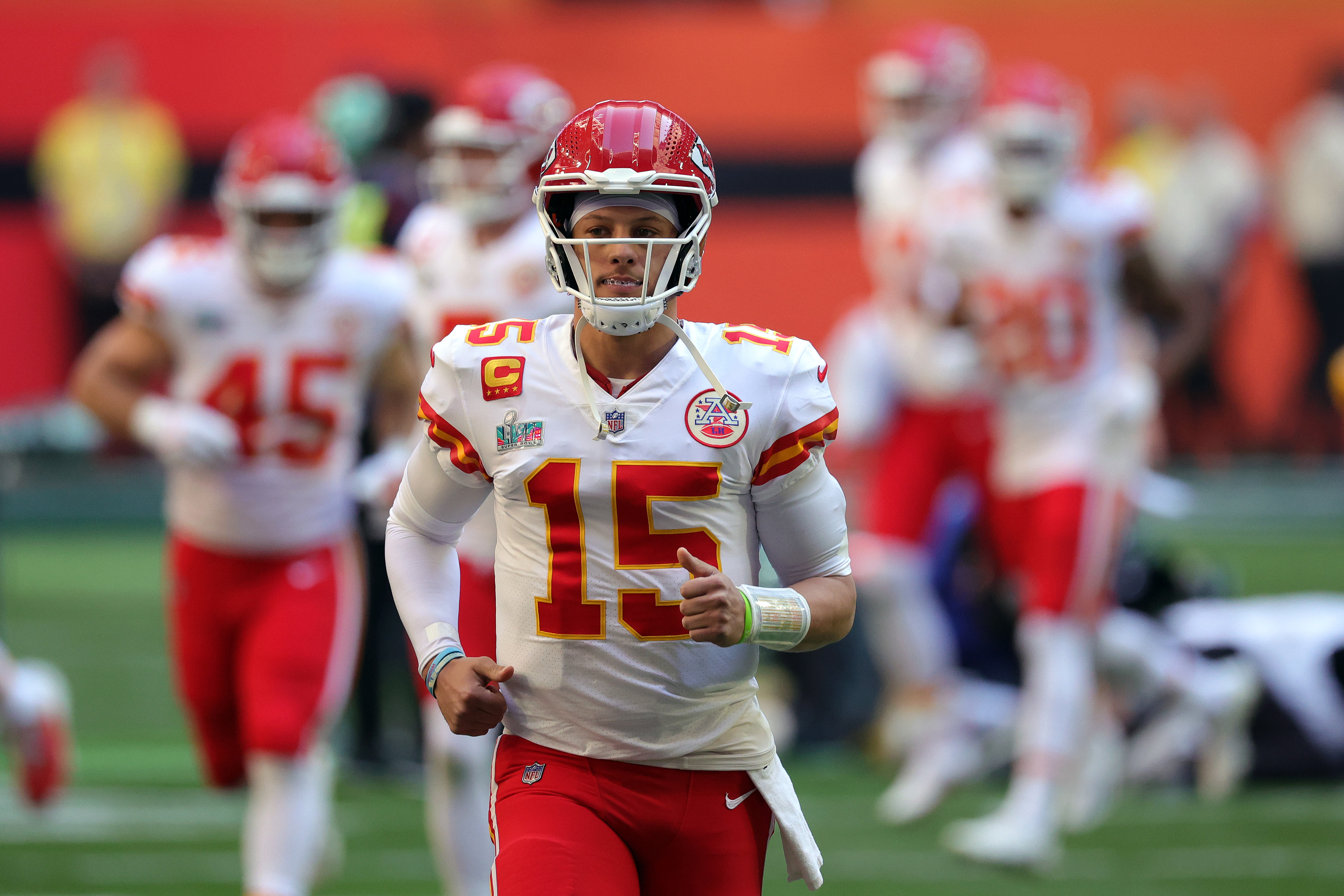Patrick Mahomes #15 of the Kansas City Chiefs runs onto the field before playing against the Philadelphia Eagles in Super Bowl LVII at State Farm Stadium on February 12, 2023 in Glendale, Arizona.