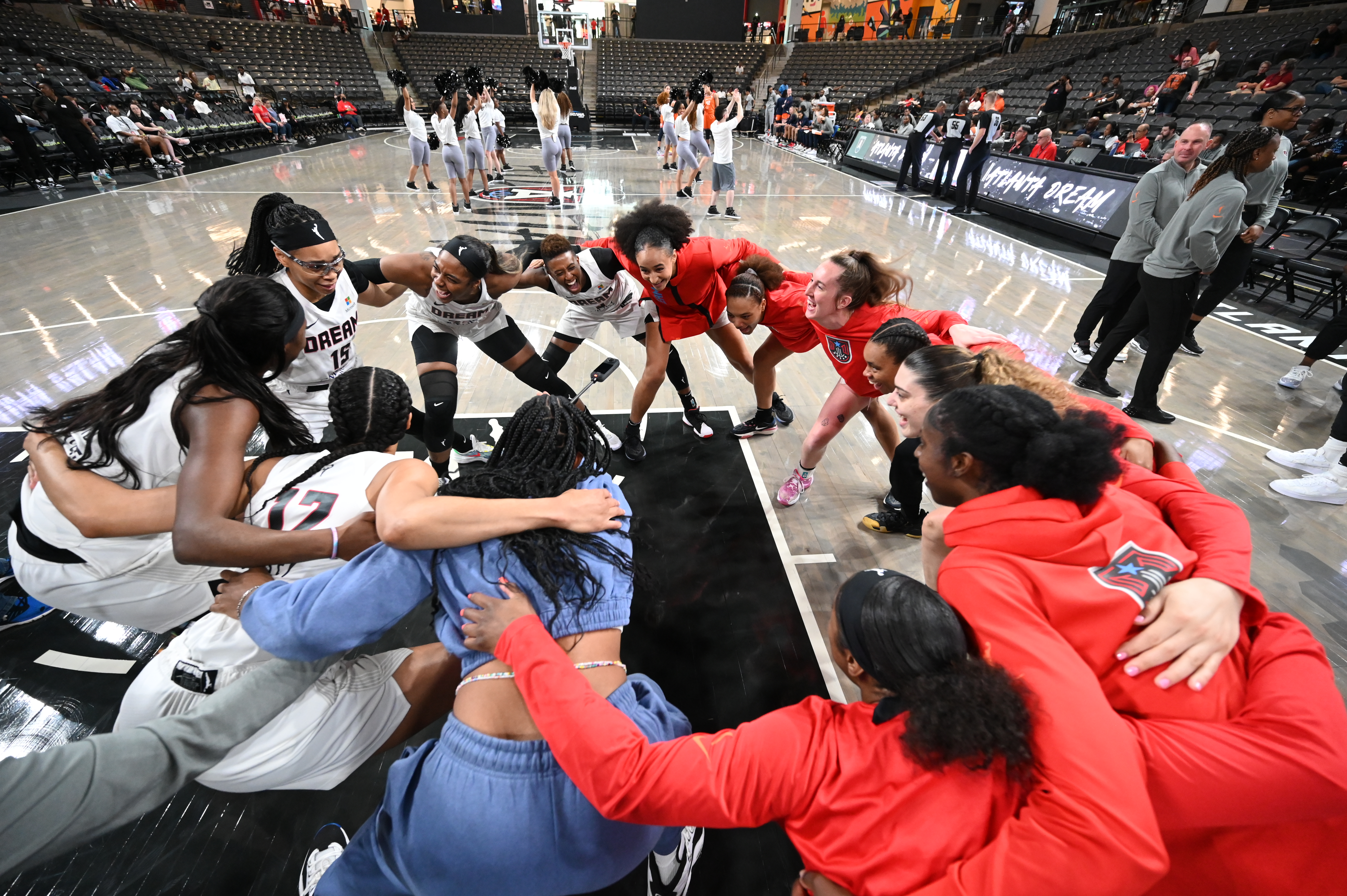 Atlanta Dream huddles up before the game against the Connecticut Sun on May 14, 2023 at Gateway Center Arena in College Park, Georgia.