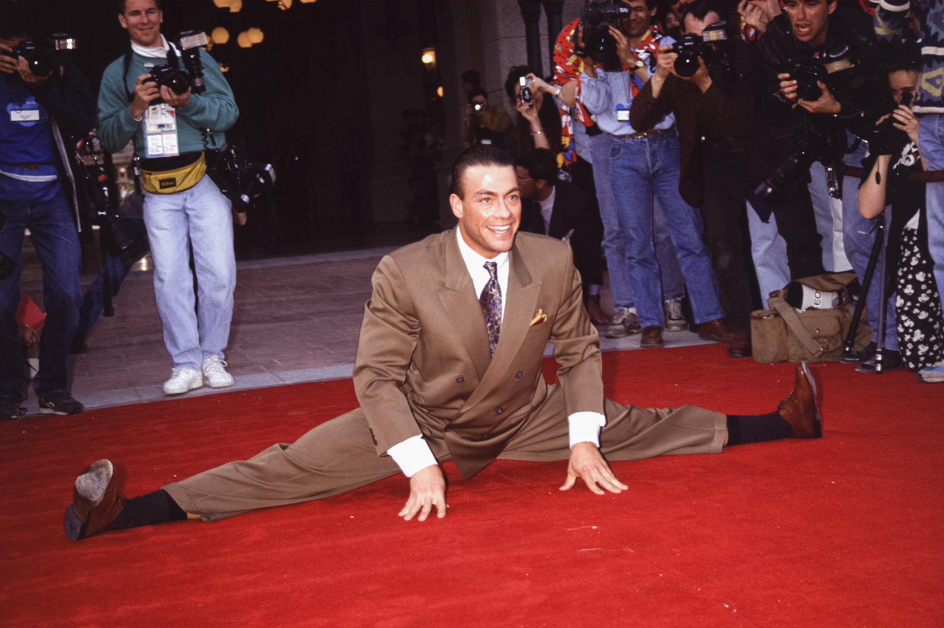 Jean-Claude Van Damme does a split on the red carpet at Disneyland Paris in 1992