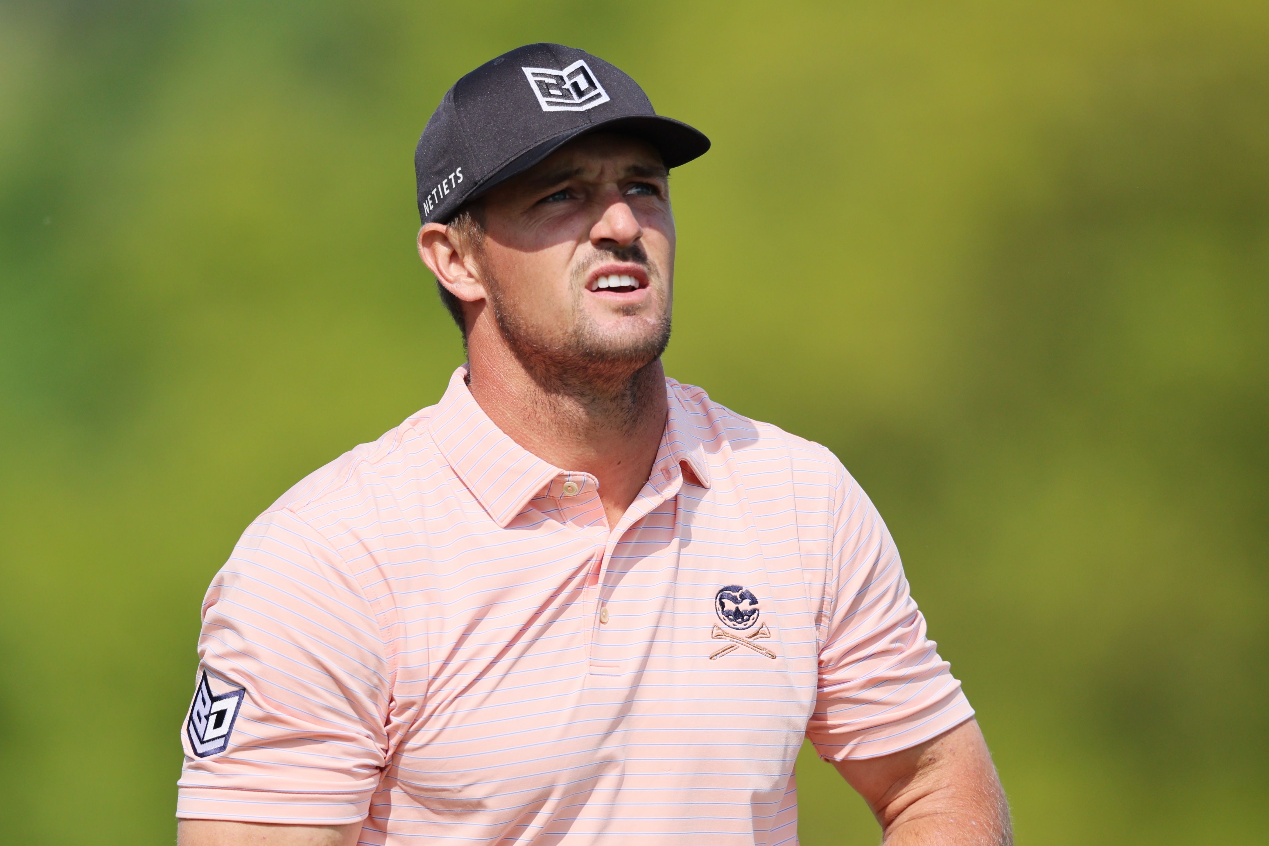 Bryson DeChambeau of the United States watches his tee shot on the ninth hole during the first round of the 2023 PGA Championship at Oak Hill Country Club on May 18, 2023 in Rochester, New York.