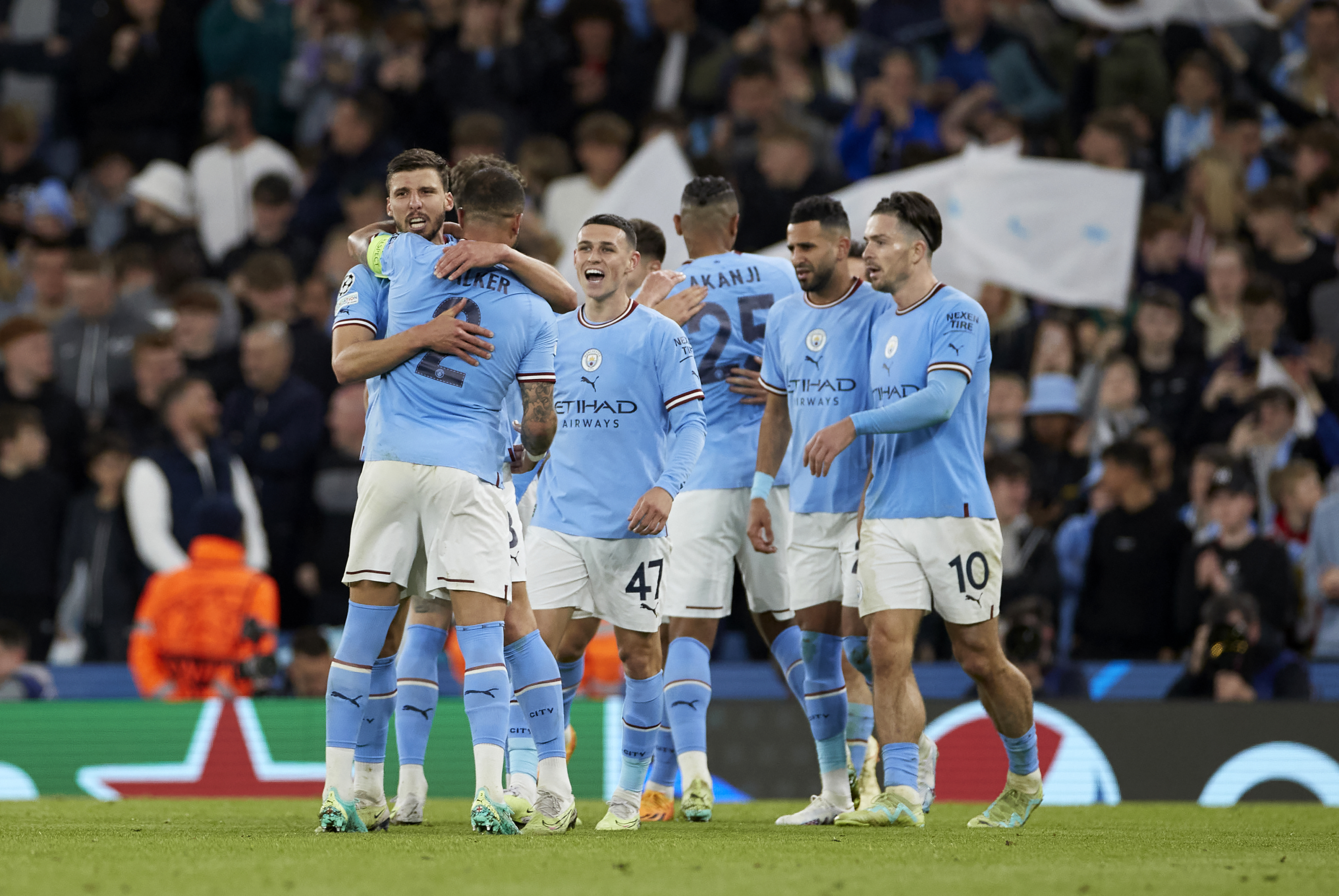 Players of Manchester City celebrate after winning the UEFA Champions League semi-final second leg match against Real Madrid at Etihad Stadium on May 17, 2023 in Manchester, United Kingdom.