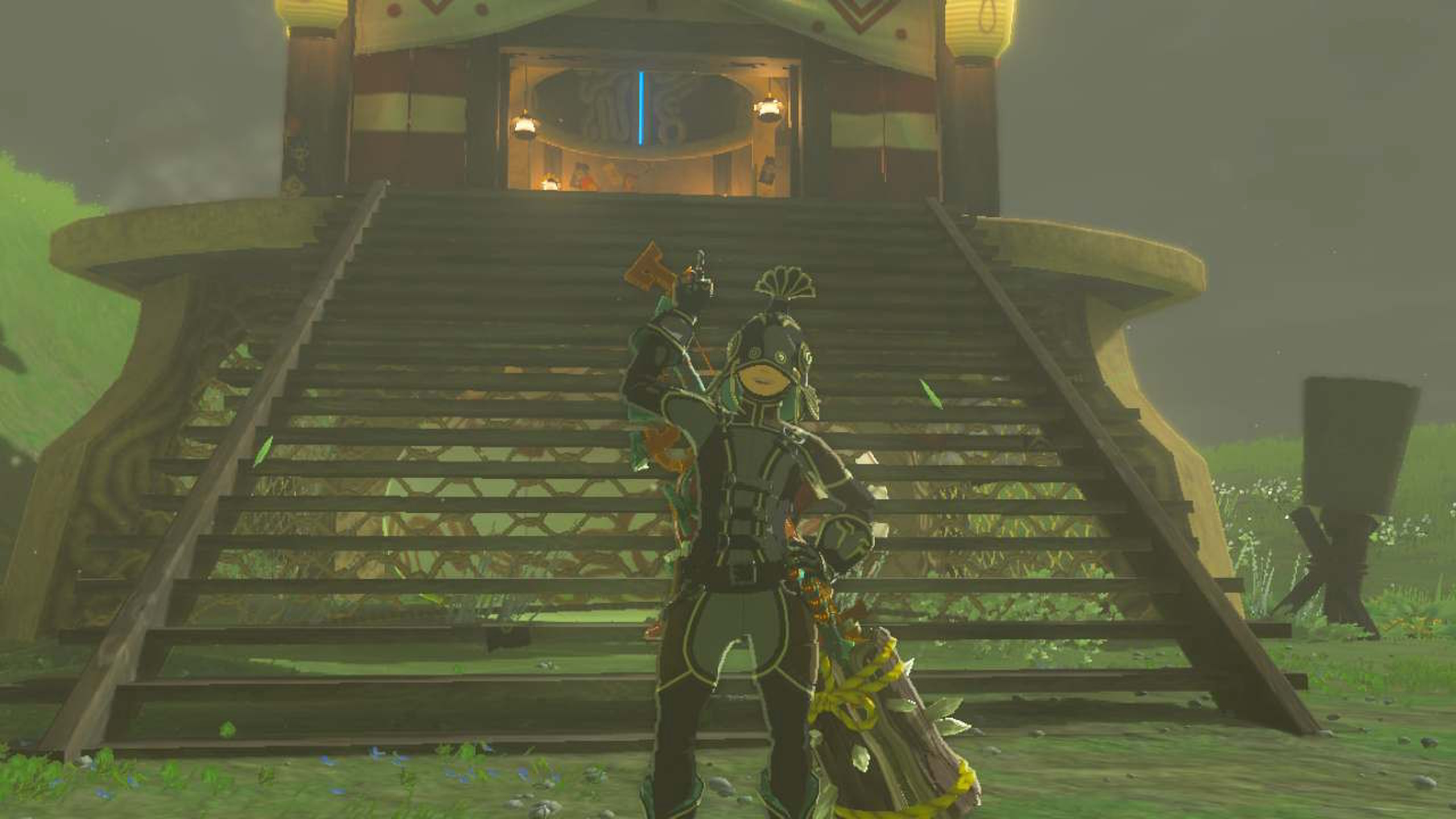 Link rocks the Rubber Armor set in front of a skyview tower in Zelda Tears of the Kingdom.