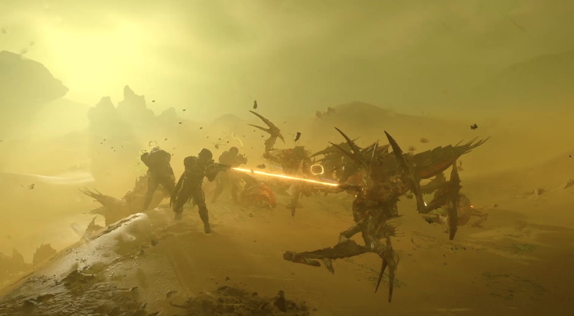 A chaotic desert planet erupts in battle as space marines take on insect-like aliens in Helldivers 2