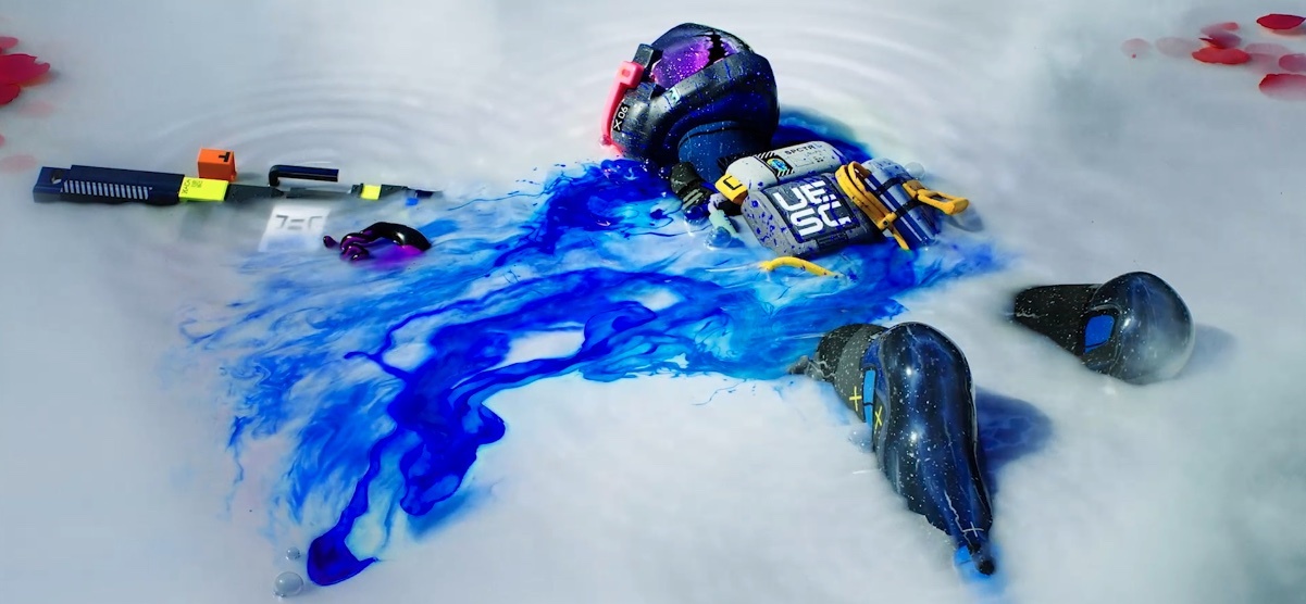 An android lying in a pool of white liquid with bright blue ‘blood’ leaking out of them