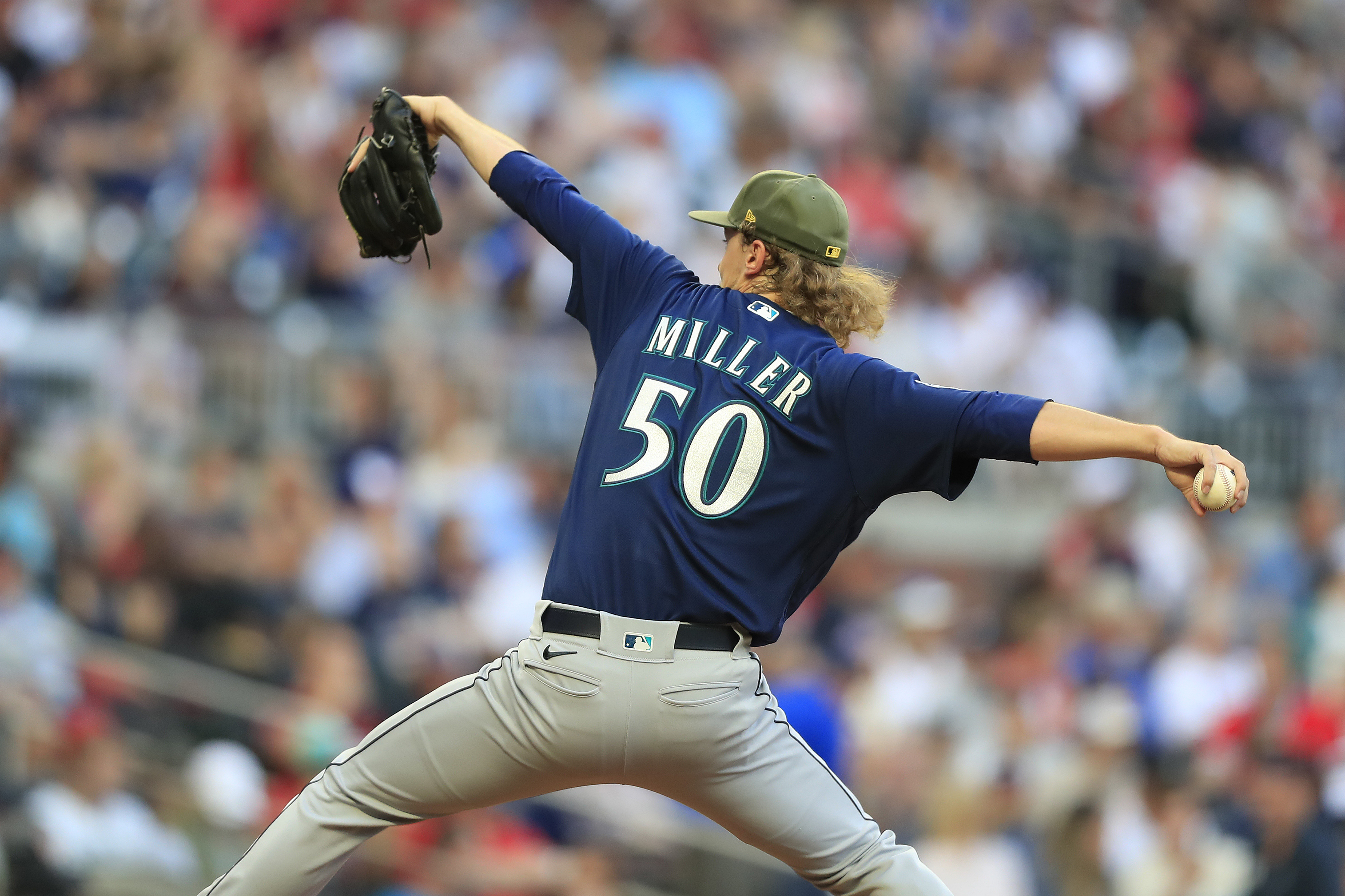 Seattle Mariners starting pitcher Bryce Miller delivers a pitch during the Friday evening MLB interleague game between the Seattle Mariners and the Atlanta Braves on May 19, 2023 at Truist Park in Atlanta, Georgia.