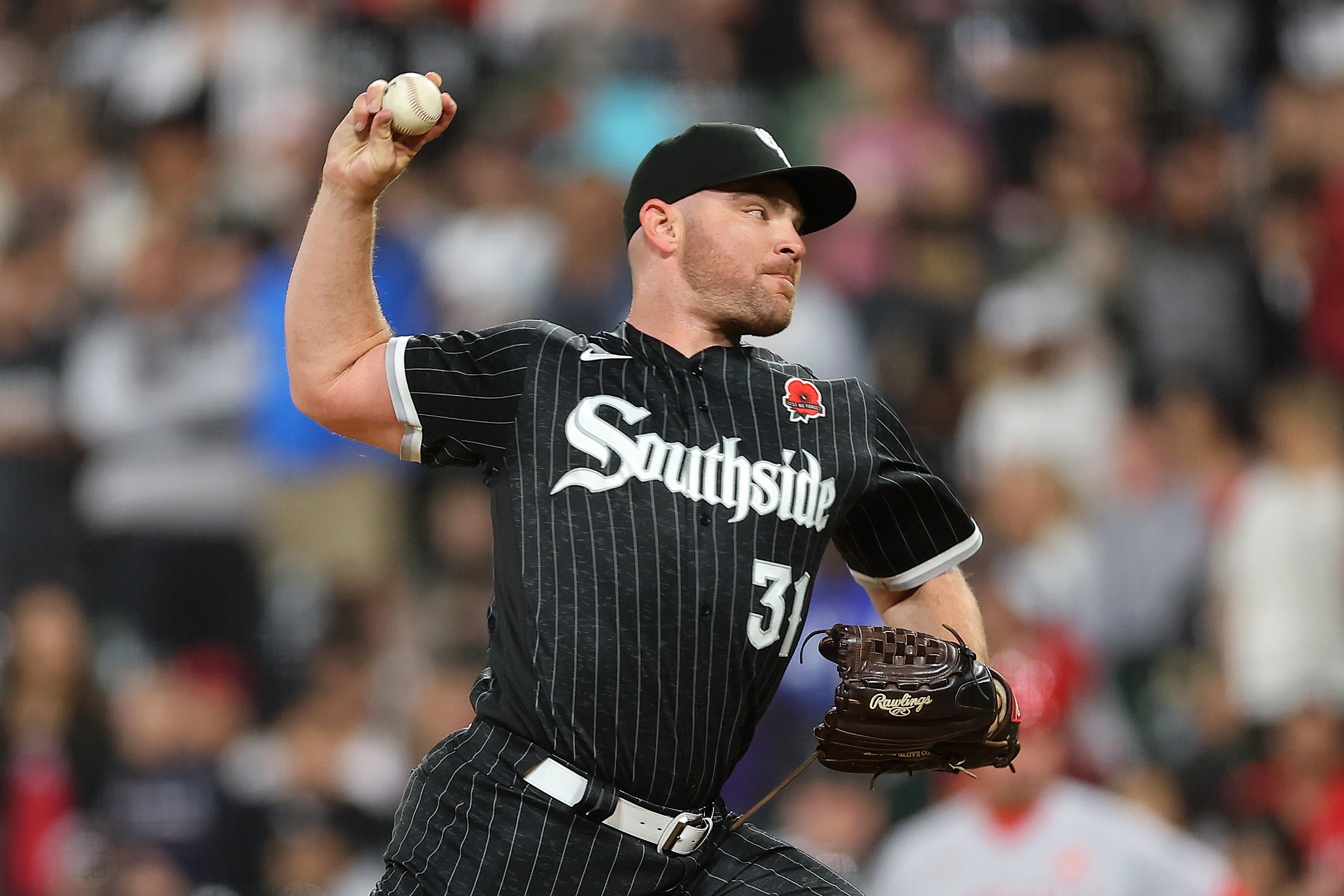 Liam Hendriks of the Chicago White Sox delivers a pitch against the Los Angeles Angels during the eighth inning at Guaranteed Rate Field on May 29, 2023 in Chicago, Illinois.
