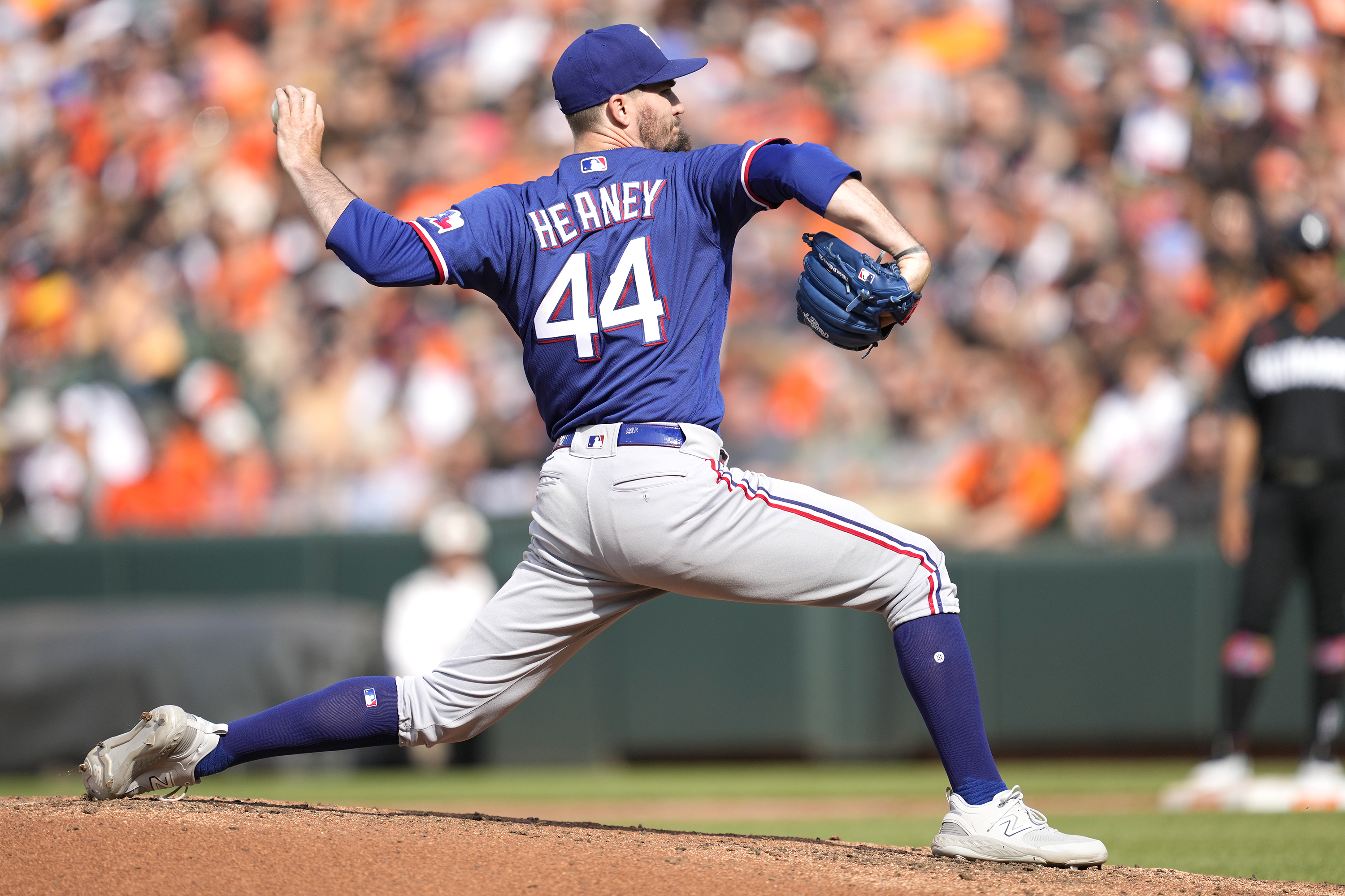 Andrew Heaney #44 of the Texas Rangers pitches in the fourth inning during a baseball game against the Baltimore Orioles at Oriole Park at Camden Yards on May 27, 2023 in Baltimore, Maryland.