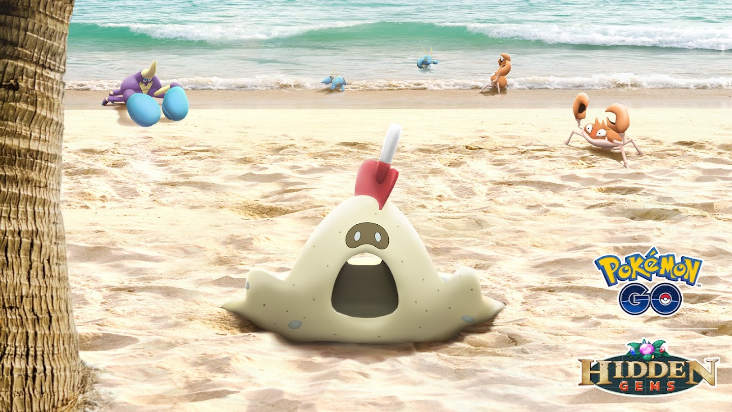 Sandygast and several other crab-like Pokémon on a beach in Pokémon Go