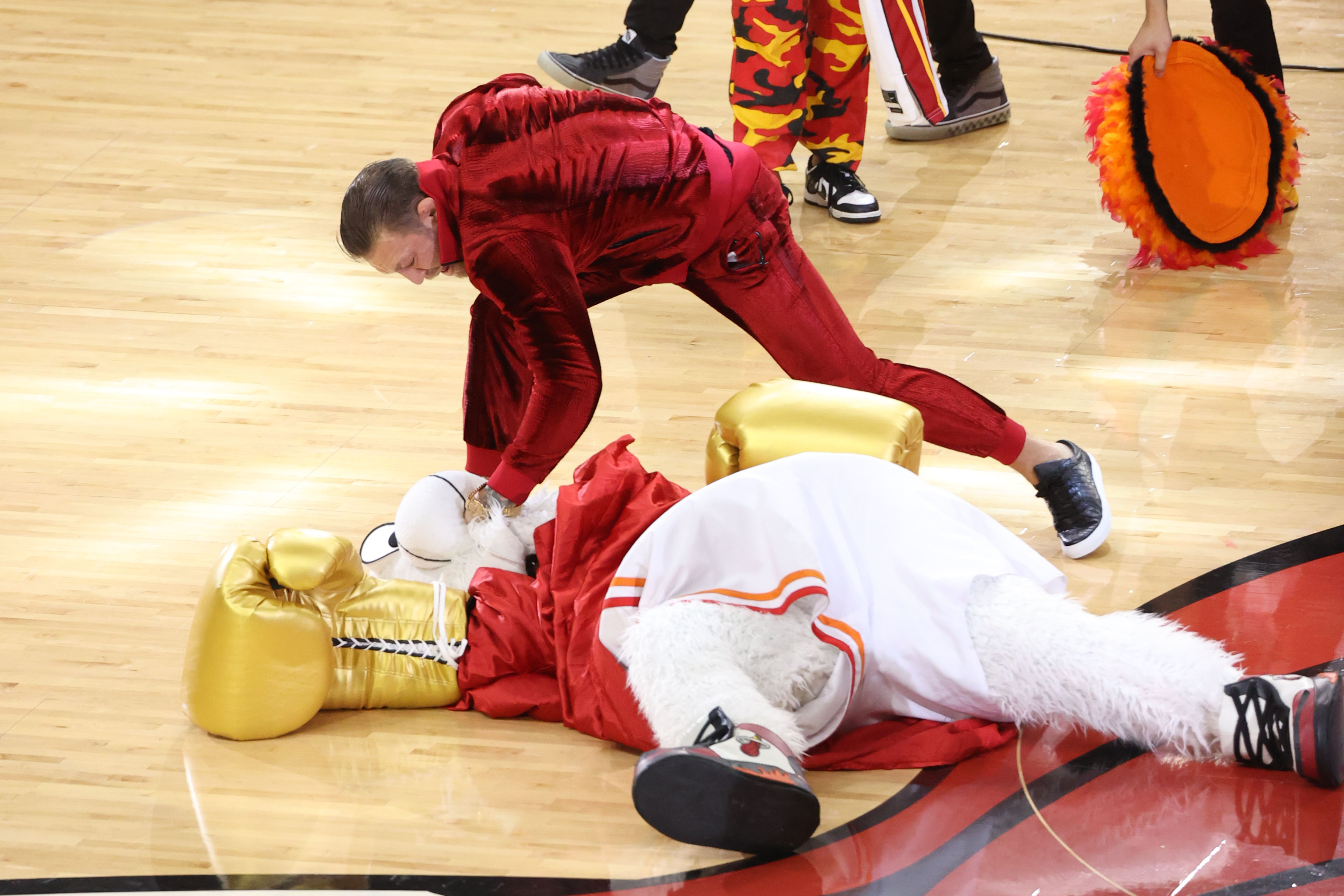 Connor McGregor and Mascot Burnie of the Miami Heat perform during halftime against the Denver Nuggets during Game Four of the 2023 NBA Finals on June 9, 2023 at Kaseya Center in Miami, Florida.