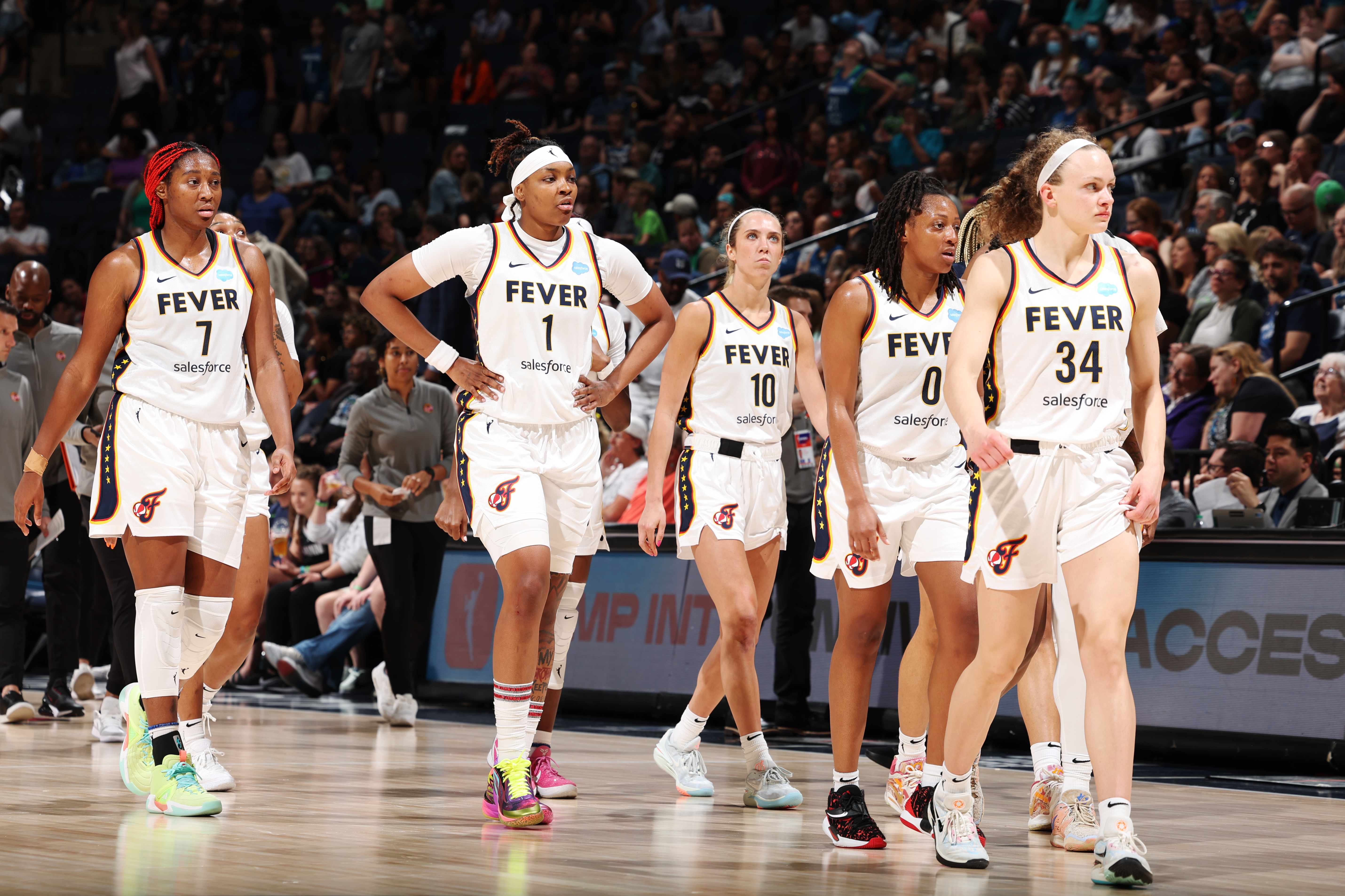 MINNEAPOLIS, MN - JUNE 9: Members of the Indiana Fever look on during the game against the Minnesota Lynx on June 9, 2023 at Target Center in Minneapolis, Minnesota.